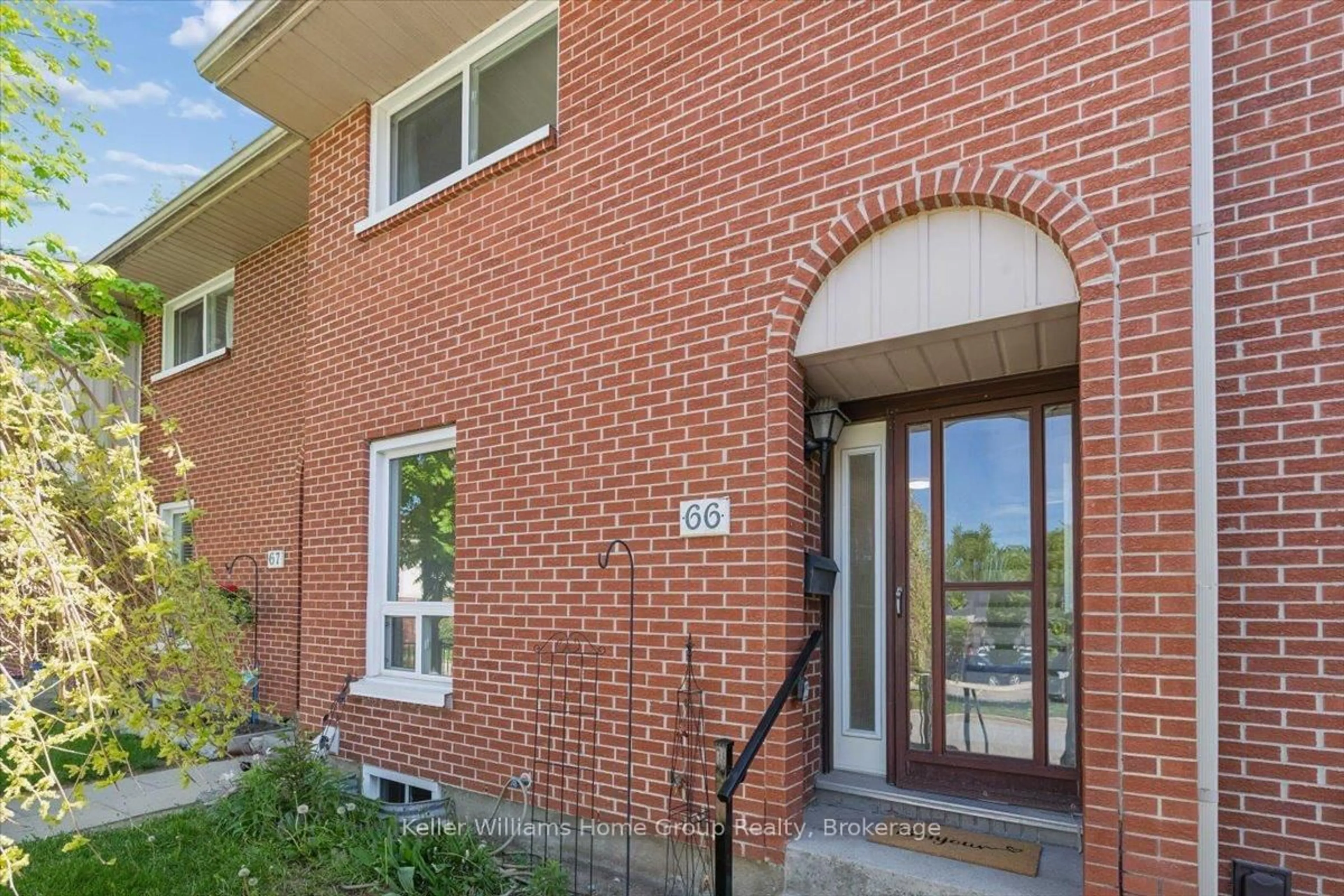 Home with brick exterior material, street for 49 Rhonda Rd #66, Guelph Ontario N1H 7A4