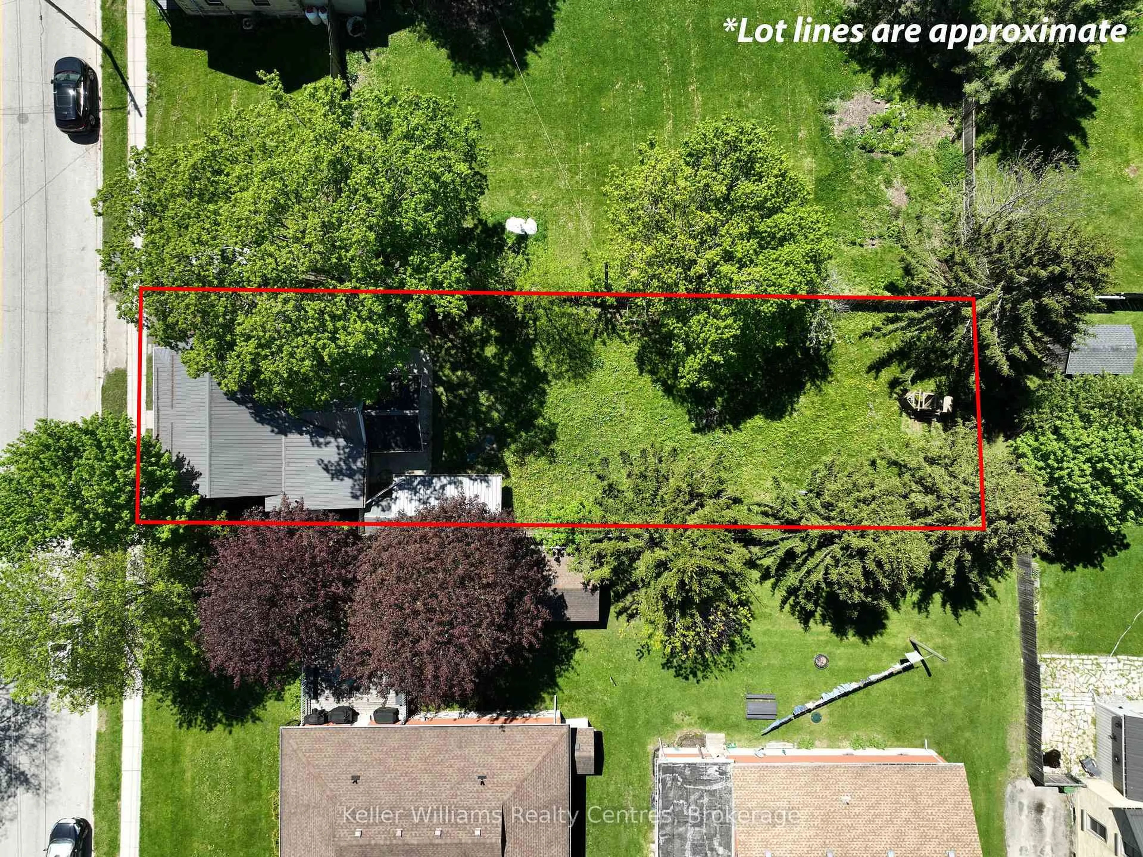 A pic from outside/outdoor area/front of a property/back of a property/a pic from drone, street for 551 Louisa St, West Grey Ontario N0G 1C0
