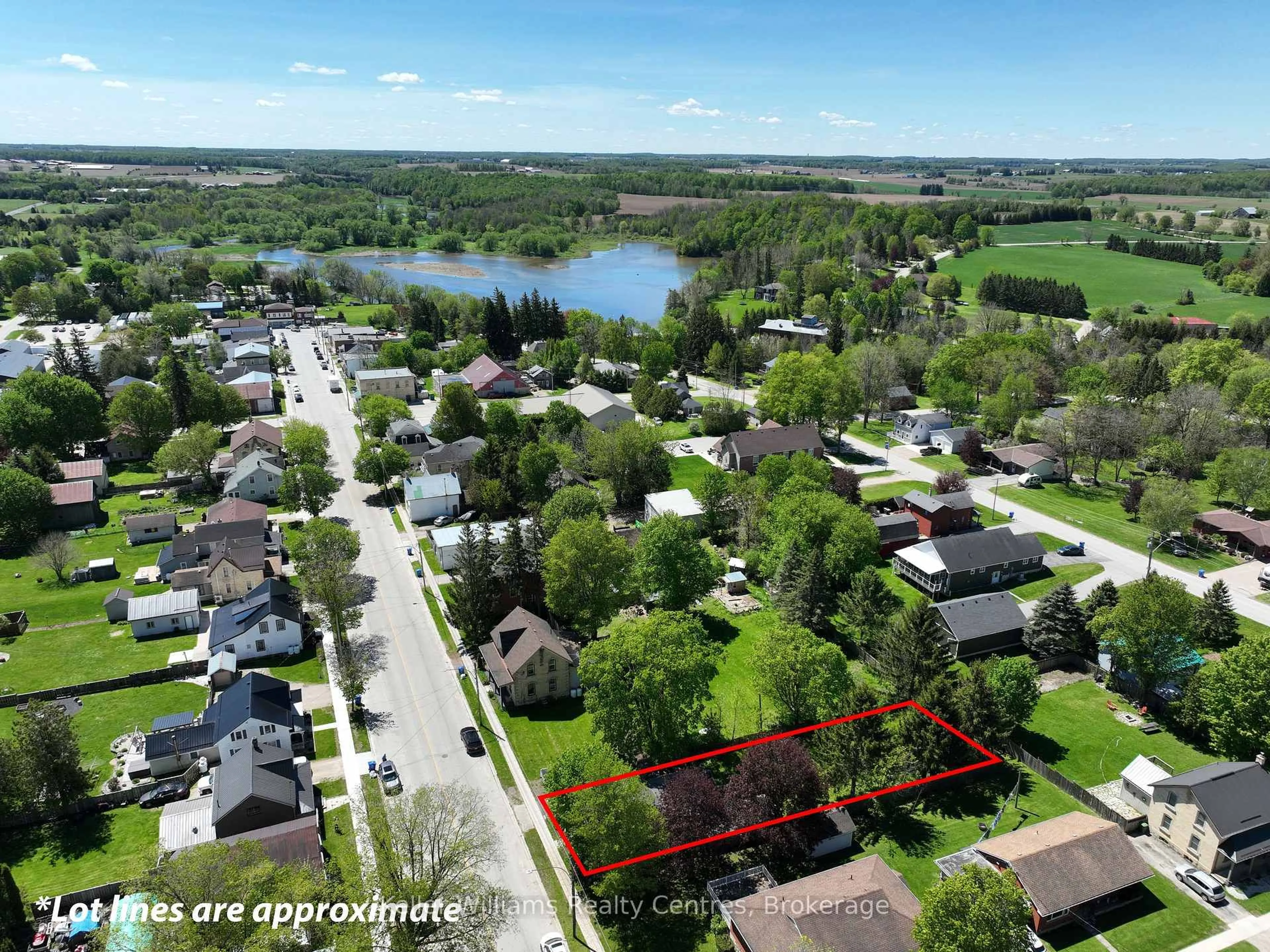 A pic from outside/outdoor area/front of a property/back of a property/a pic from drone, water/lake/river/ocean view for 551 Louisa St, West Grey Ontario N0G 1C0