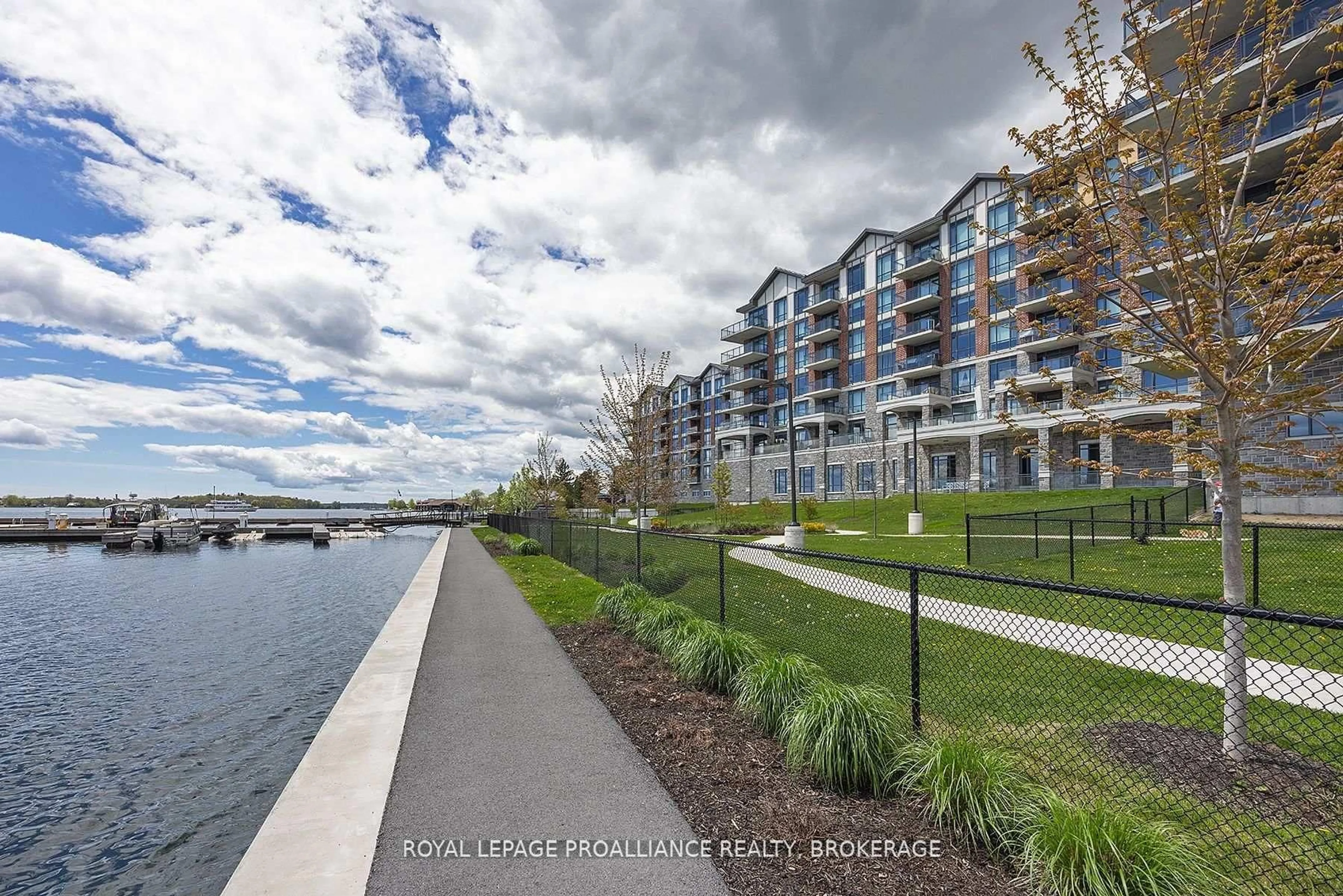 A pic from outside/outdoor area/front of a property/back of a property/a pic from drone, water/lake/river/ocean view for 129A South St #410, Gananoque Ontario K7G 0A9