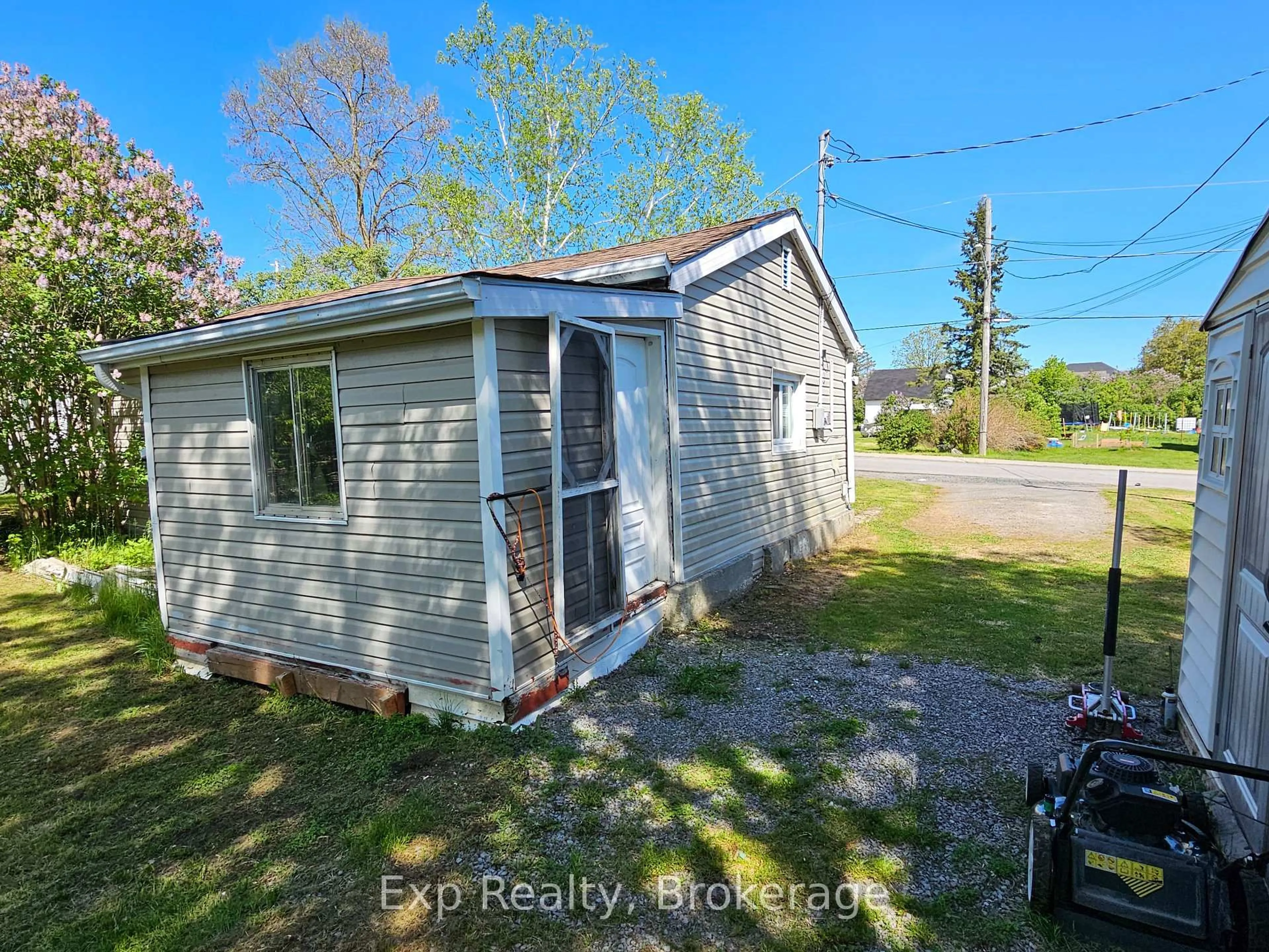 A pic from outside/outdoor area/front of a property/back of a property/a pic from drone, water/lake/river/ocean view for 12 William St, Limoges Ontario K0K 2M0