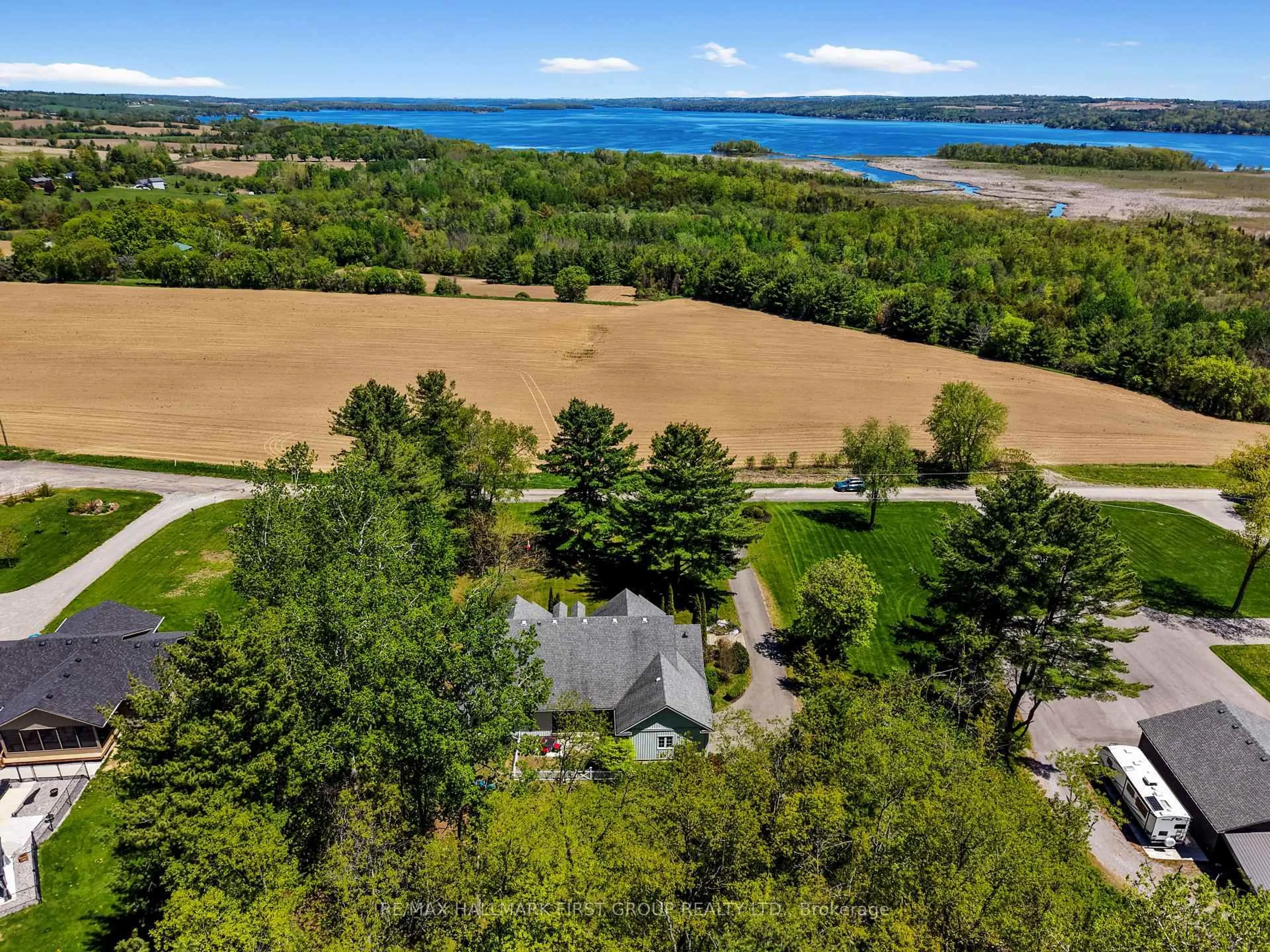 A pic from outside/outdoor area/front of a property/back of a property/a pic from drone, water/lake/river/ocean view for 9770 Lakeview Lane, Port Hope Ontario L0A 1G0