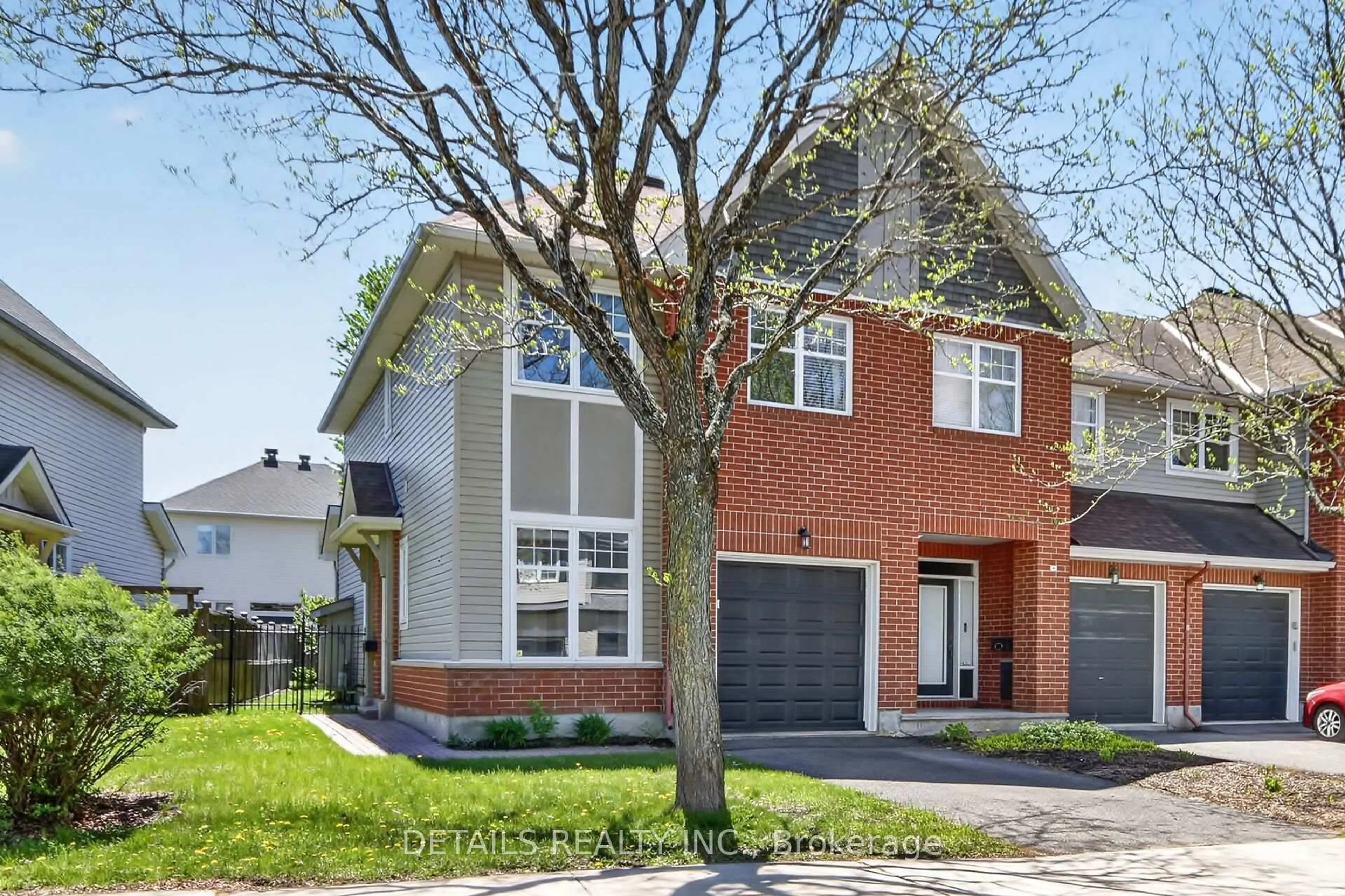 Home with brick exterior material, street for 120 Waterbridge Dr, Ottawa Ontario K2G 7C2