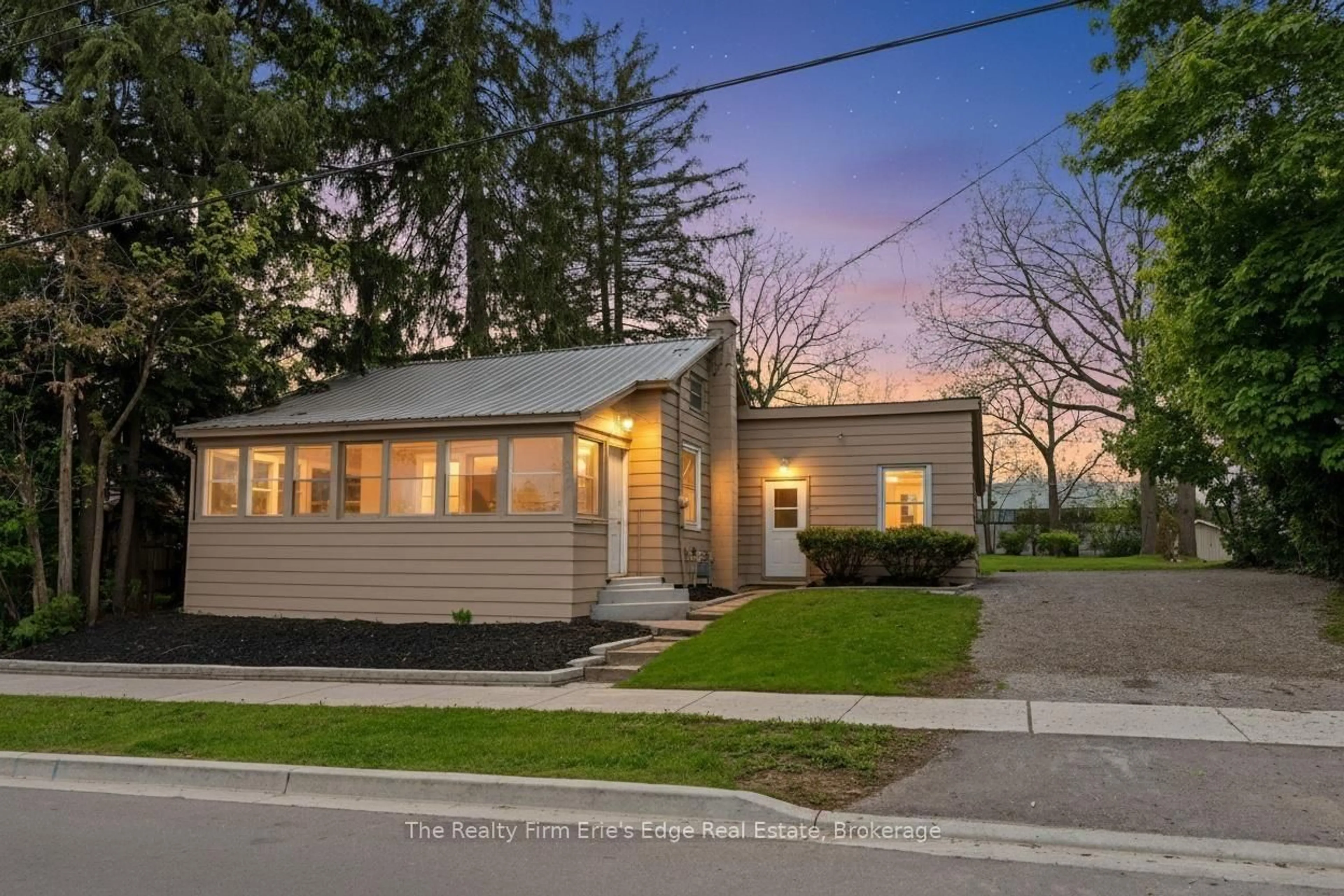Home with vinyl exterior material, street for 209 St Andrew St, Norfolk Ontario N0A 1N0