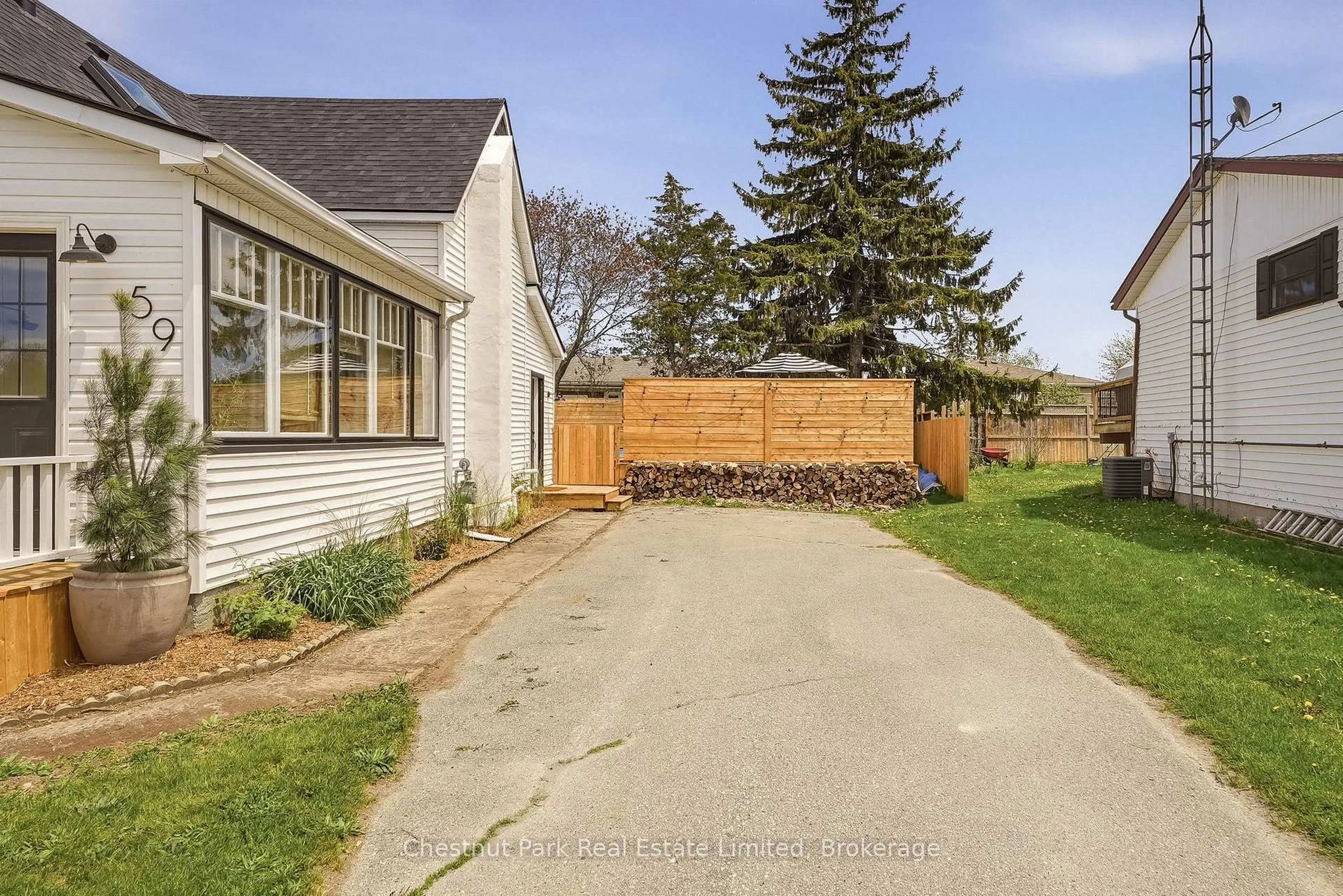 A pic from outside/outdoor area/front of a property/back of a property/a pic from drone, street for 59 Maple St, Prince Edward County Ontario K0K 3L0