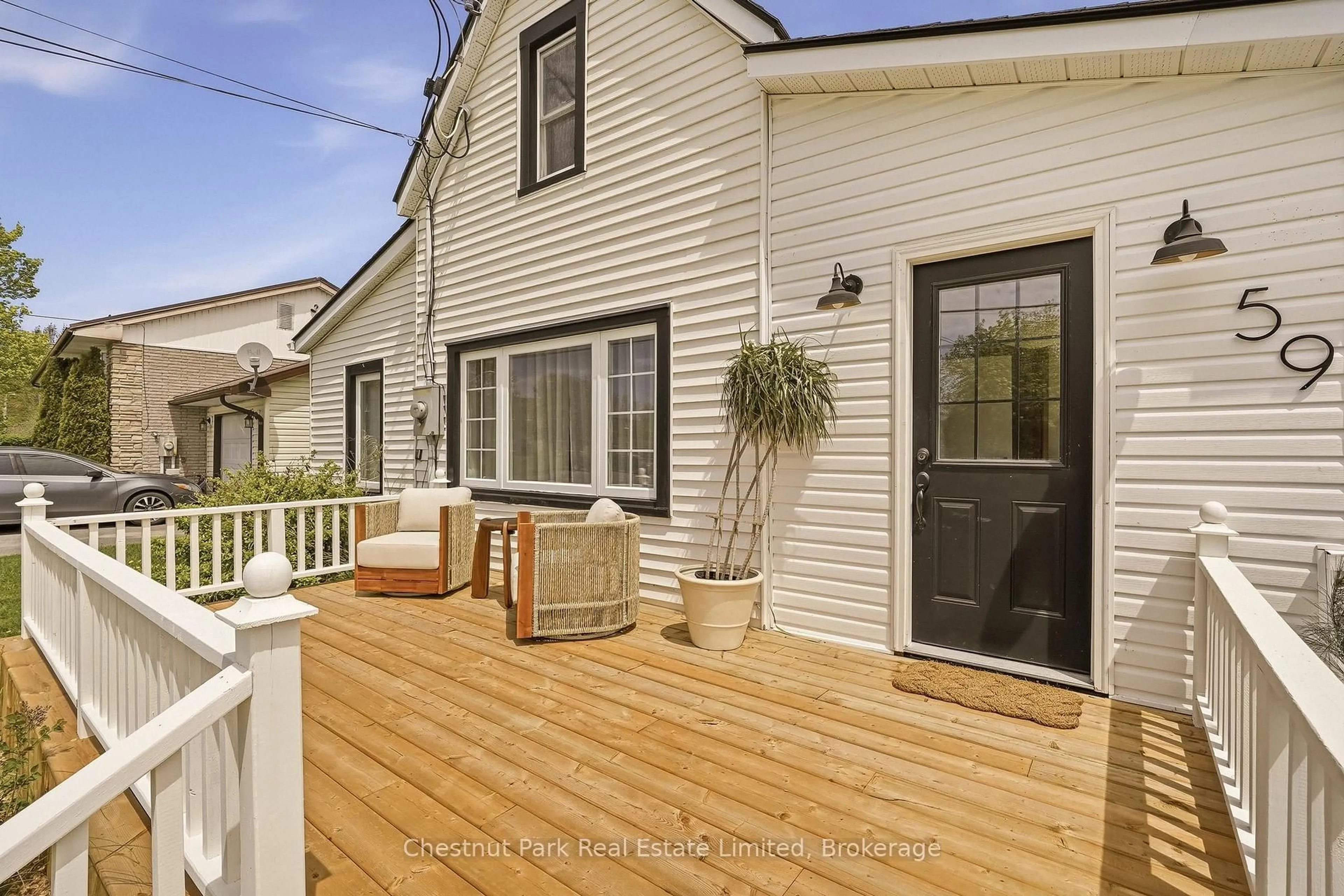 Home with vinyl exterior material, street for 59 Maple St, Prince Edward County Ontario K0K 3L0