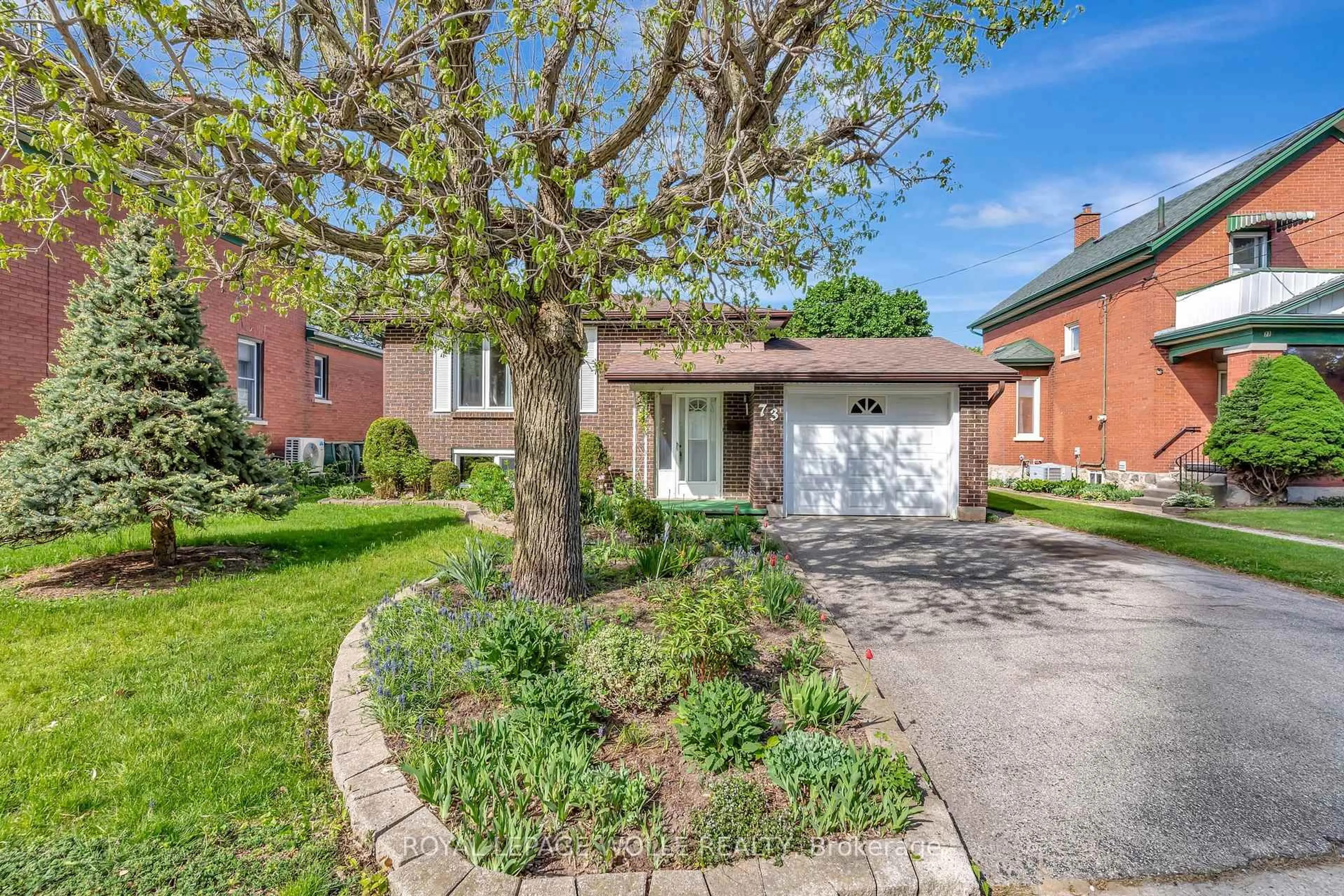 Home with brick exterior material, street for 73 Brunswick Ave, Kitchener Ontario N2H 4E7