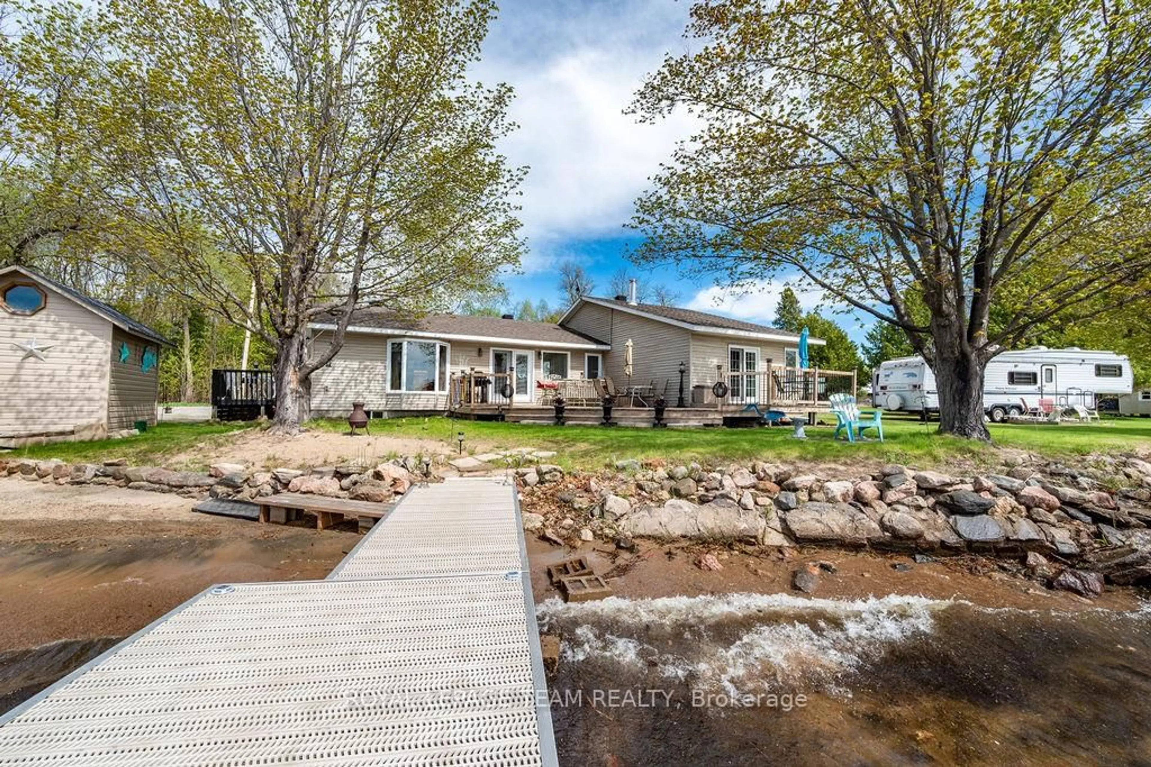A pic from outside/outdoor area/front of a property/back of a property/a pic from drone, water/lake/river/ocean view for 437 Island View Dr, Golden Lake Ontario K0J 1X0