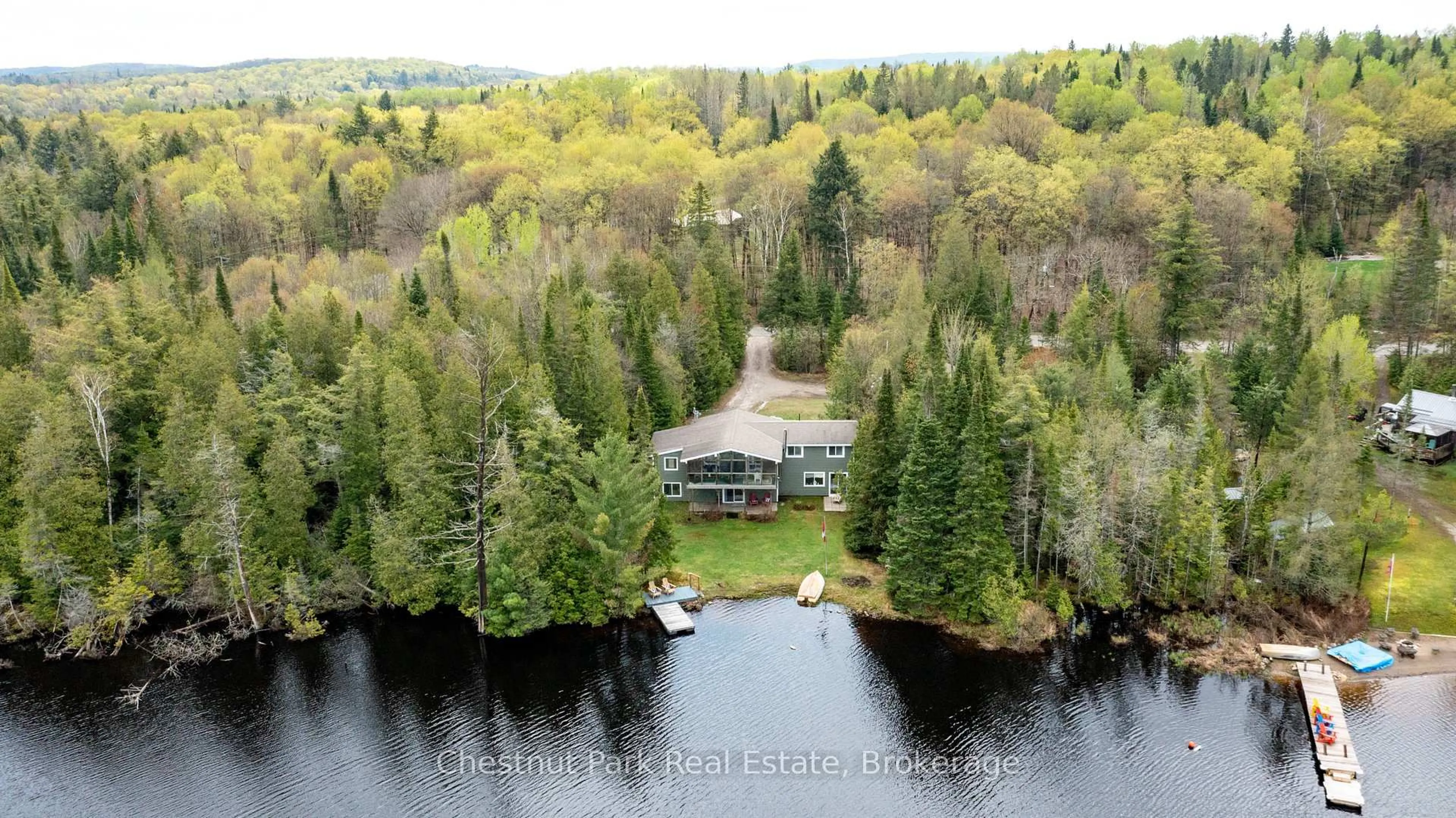 A pic from outside/outdoor area/front of a property/back of a property/a pic from drone, water/lake/river/ocean view for 14 Lakeview Dr, Perry Ontario P0A 1R0