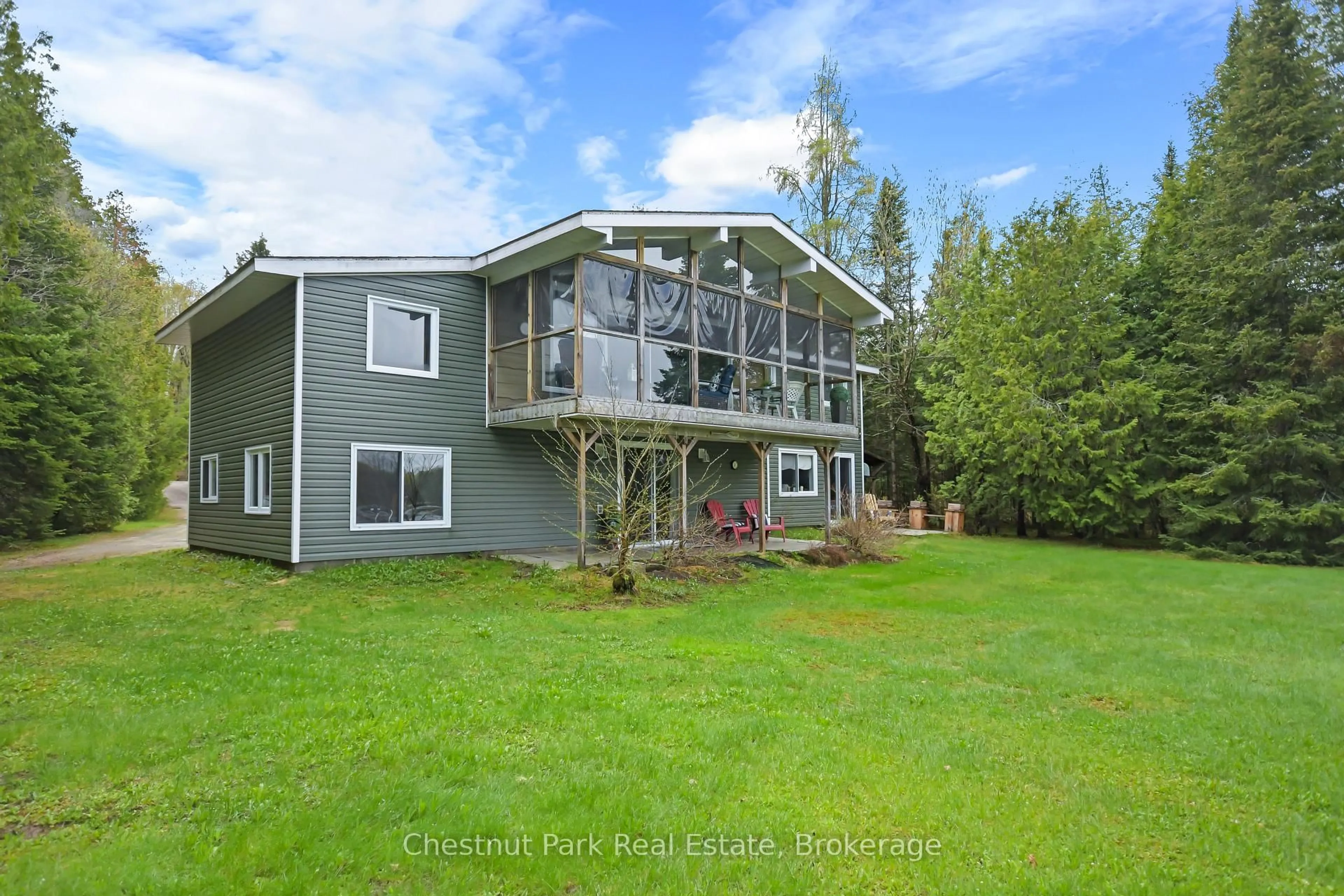 A pic from outside/outdoor area/front of a property/back of a property/a pic from drone, water/lake/river/ocean view for 14 Lakeview Dr, Perry Ontario P0A 1R0