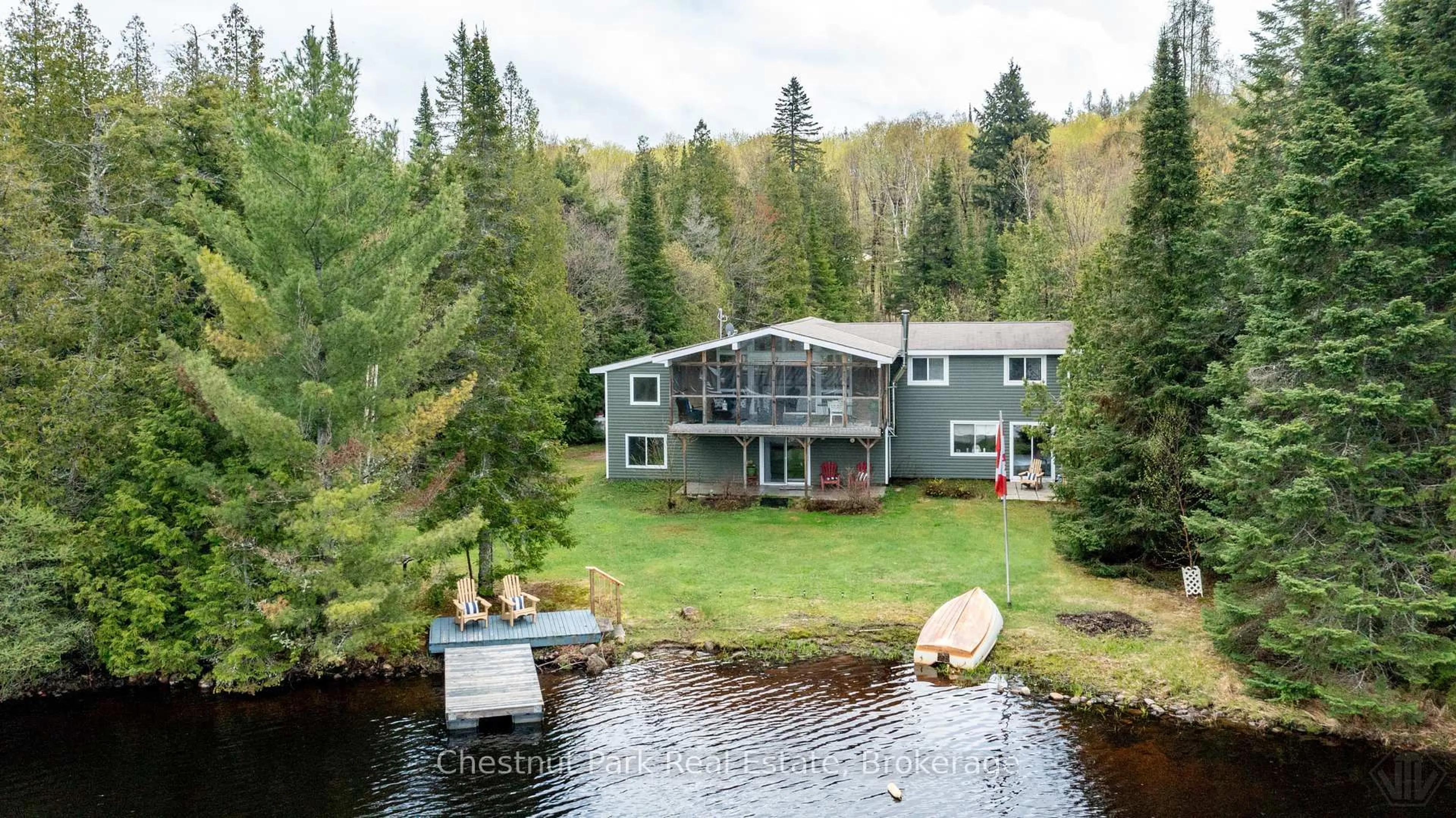 A pic from outside/outdoor area/front of a property/back of a property/a pic from drone, water/lake/river/ocean view for 14 Lakeview Dr, Perry Ontario P0A 1R0