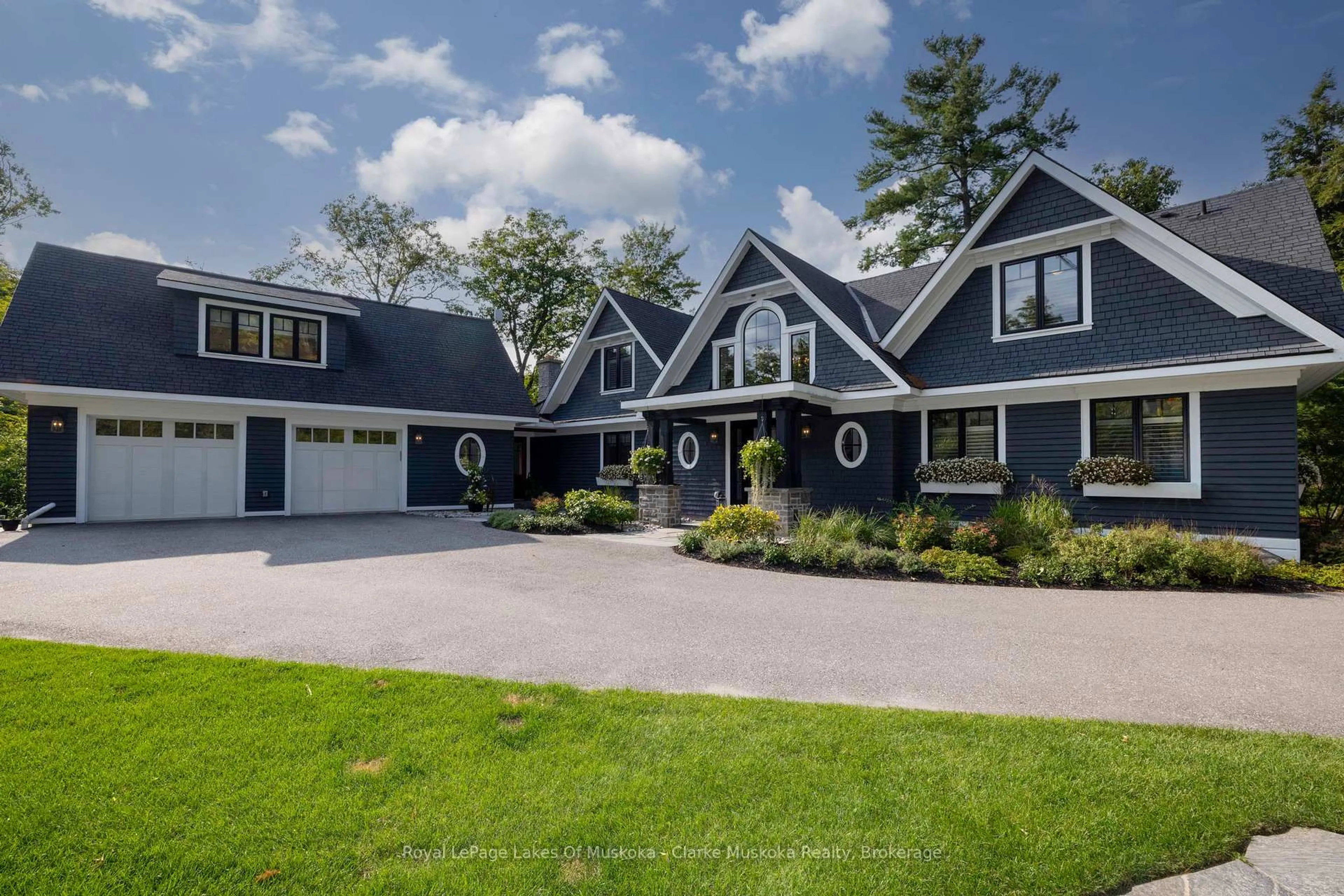 Home with vinyl exterior material, street for 1079 Trillium Rd, Muskoka Lakes Ontario P0B 1J0
