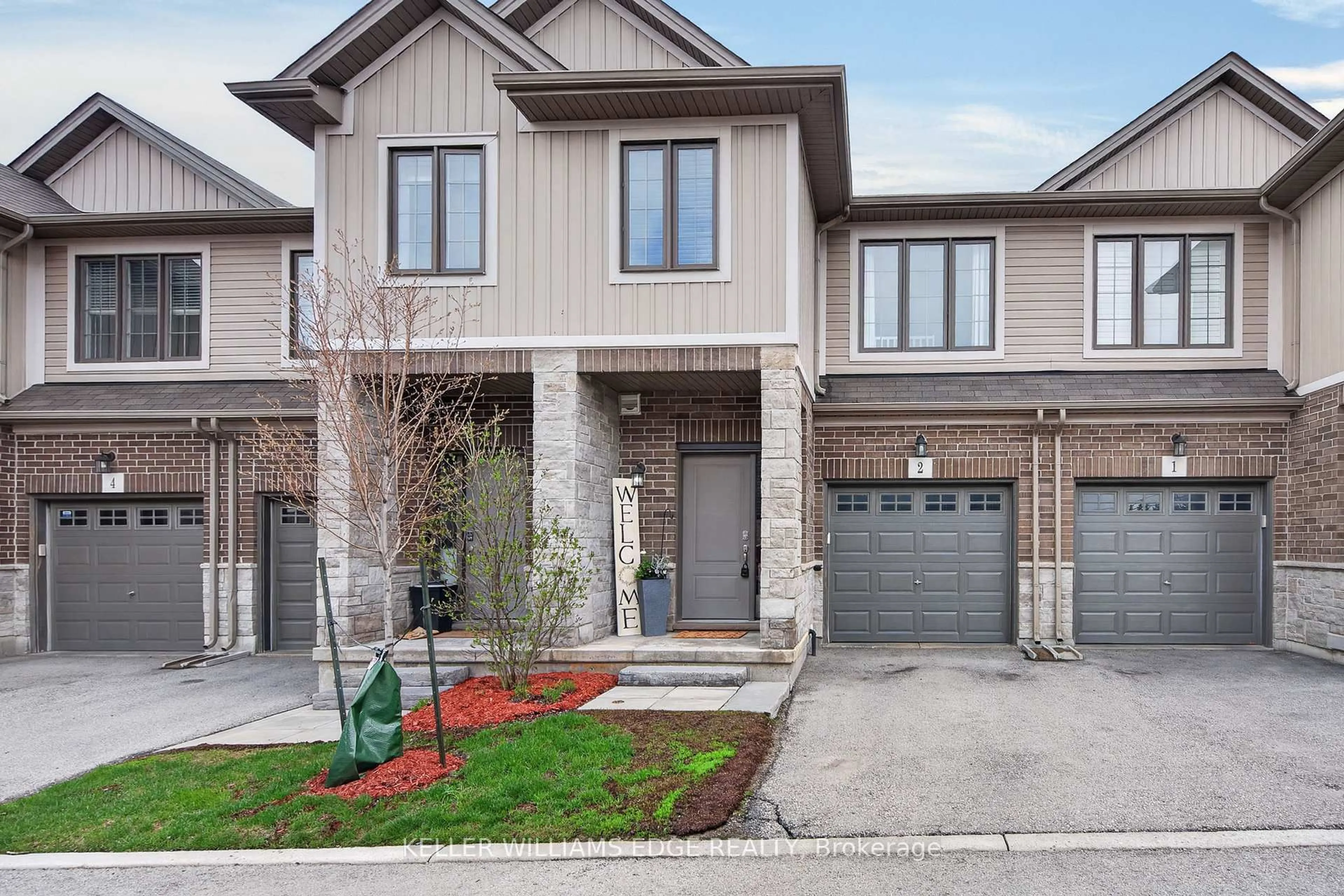 Home with brick exterior material, street for 377 Glancaster Rd #2, Hamilton Ontario L9G 0G4