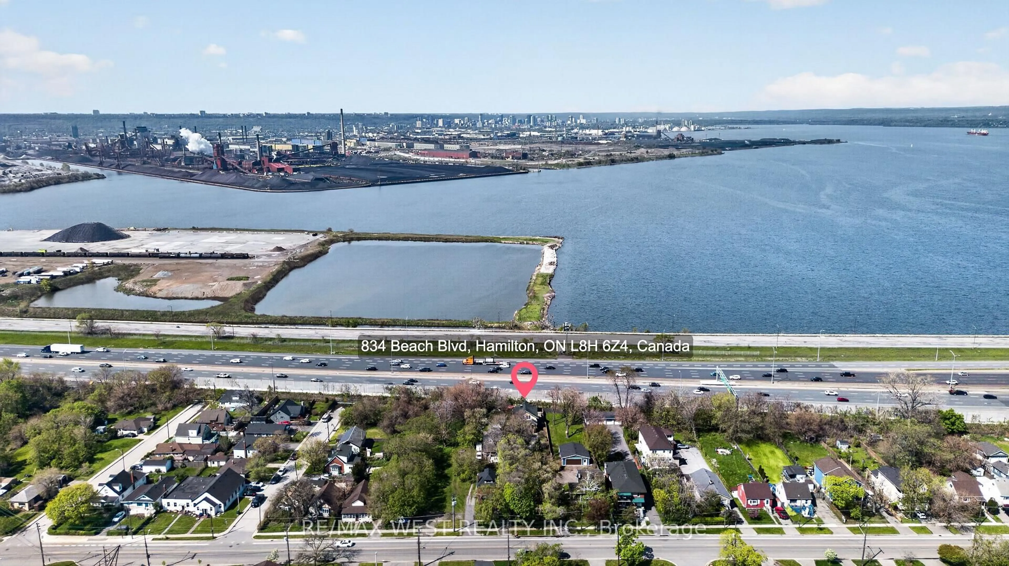 A pic from outside/outdoor area/front of a property/back of a property/a pic from drone, water/lake/river/ocean view for 834 Beach Blvd, Hamilton Ontario L8H 6Z4