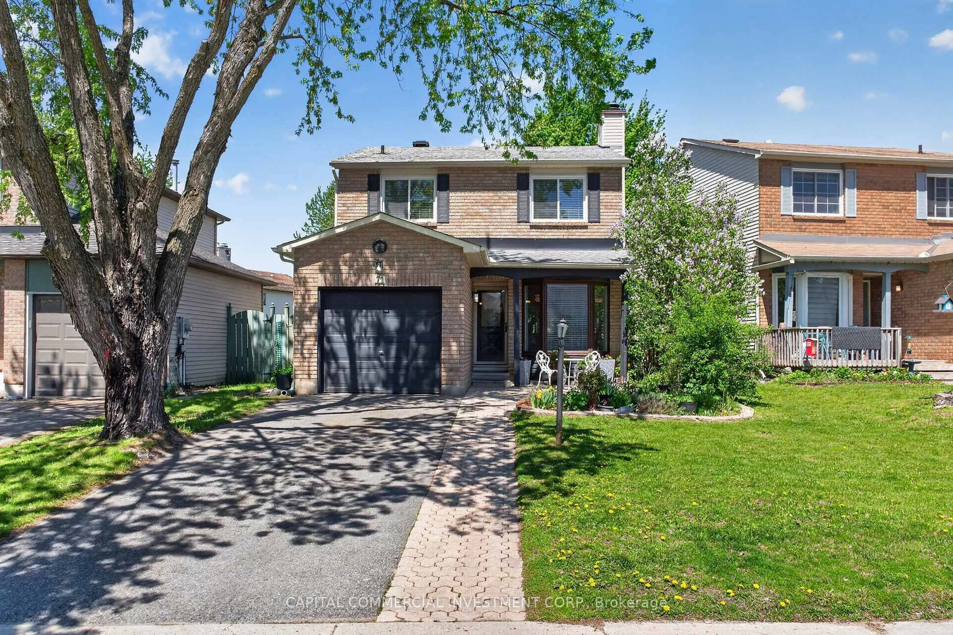 Home with brick exterior material, street for 71 Equestrian Dr, Ottawa Ontario K2M 1H7