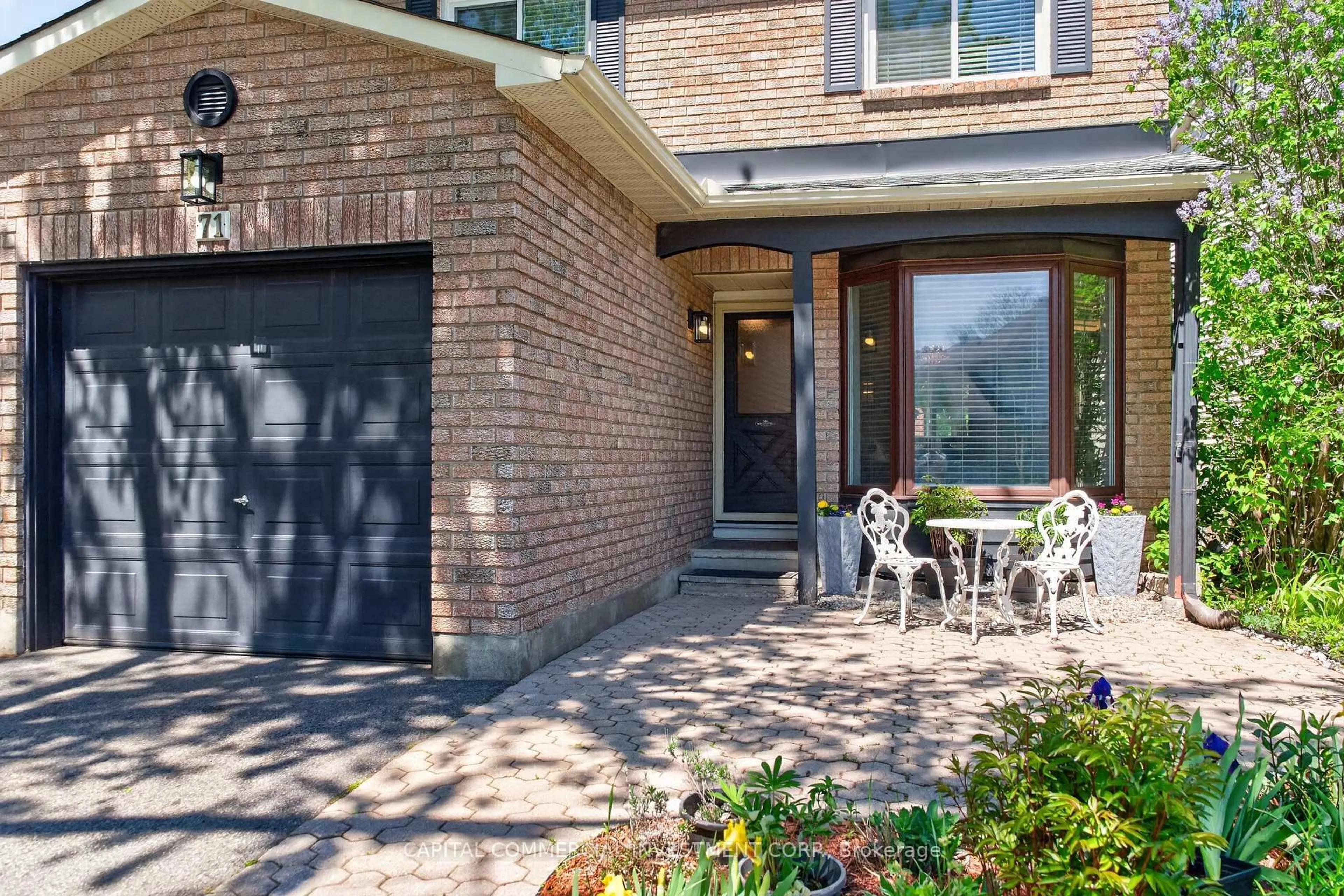 Home with brick exterior material, street for 71 Equestrian Dr, Ottawa Ontario K2M 1H7