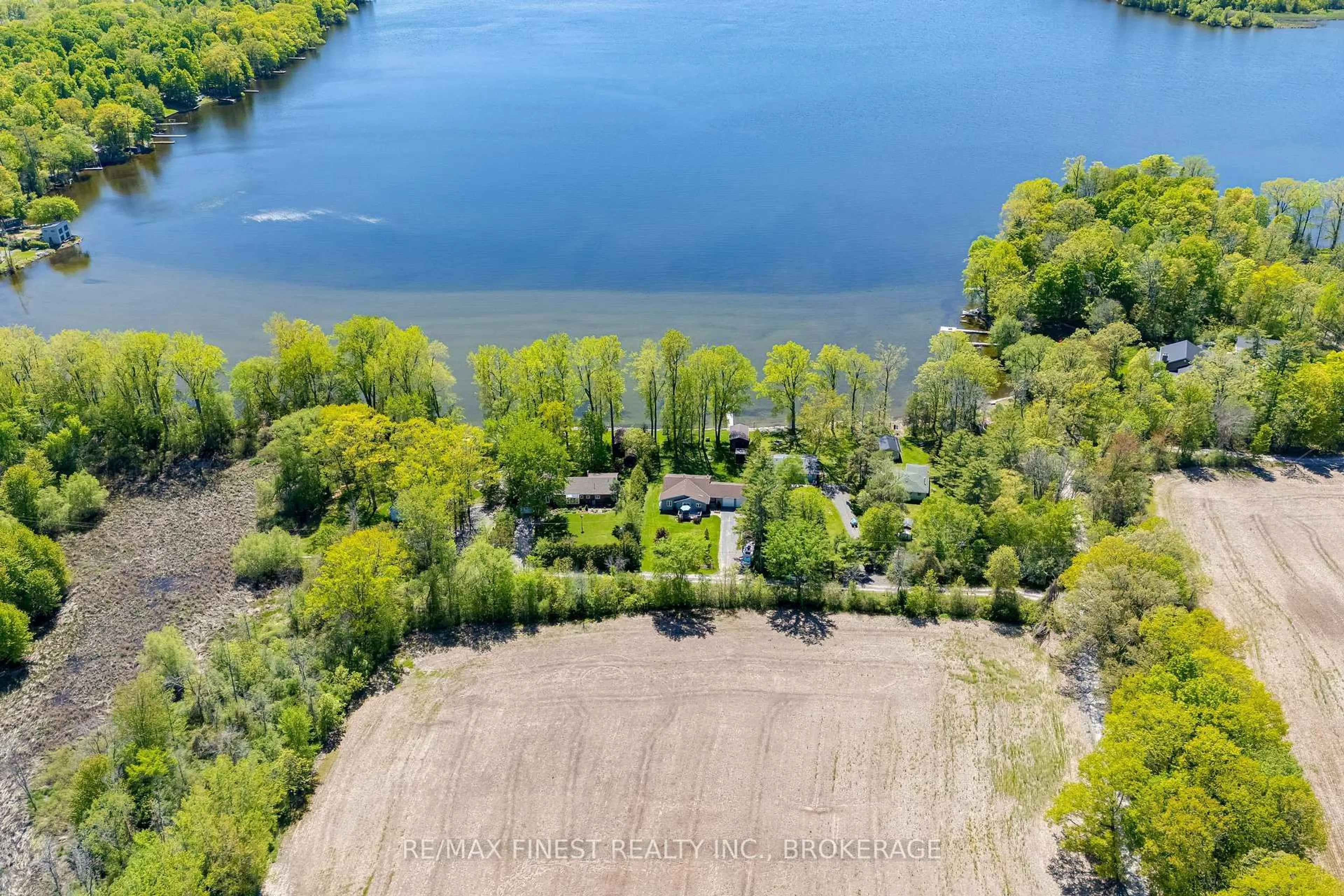 A pic from outside/outdoor area/front of a property/back of a property/a pic from drone, water/lake/river/ocean view for 14 Sunset Lane, Napanee Ontario K7R 3K7