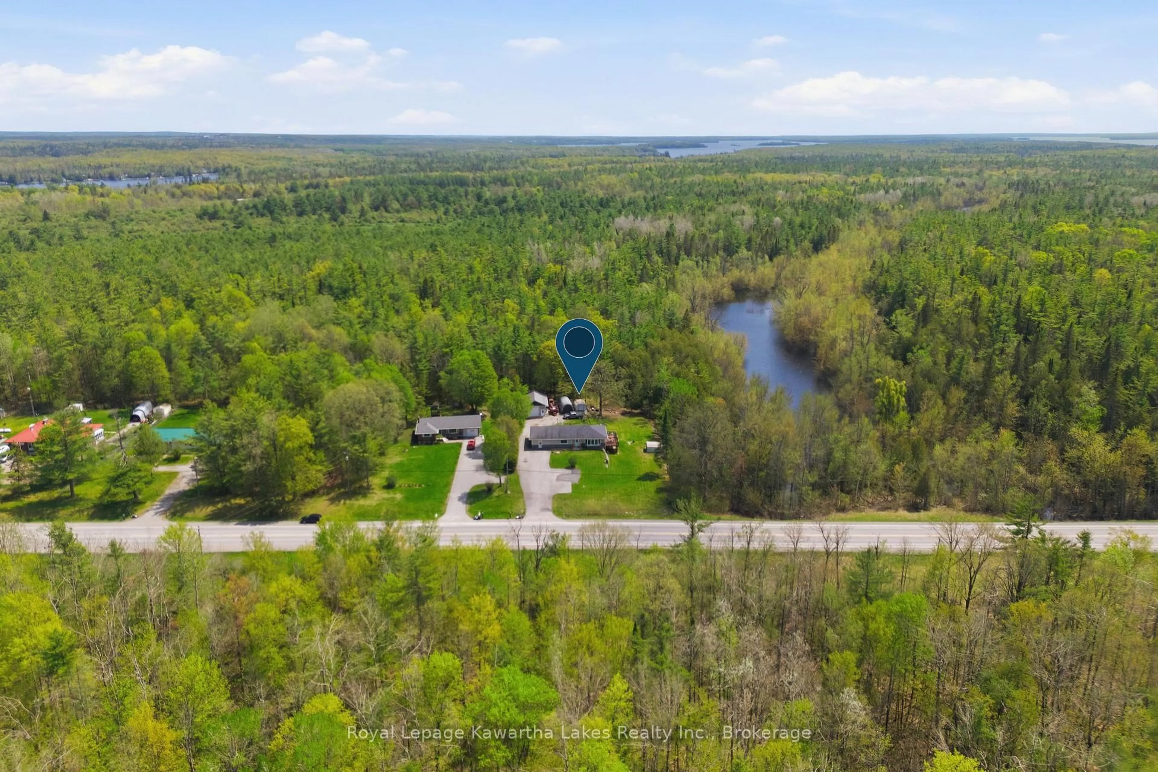 A pic from outside/outdoor area/front of a property/back of a property/a pic from drone, water/lake/river/ocean view for 2794 County Road 48, Kawartha Lakes Ontario K0M 1K0