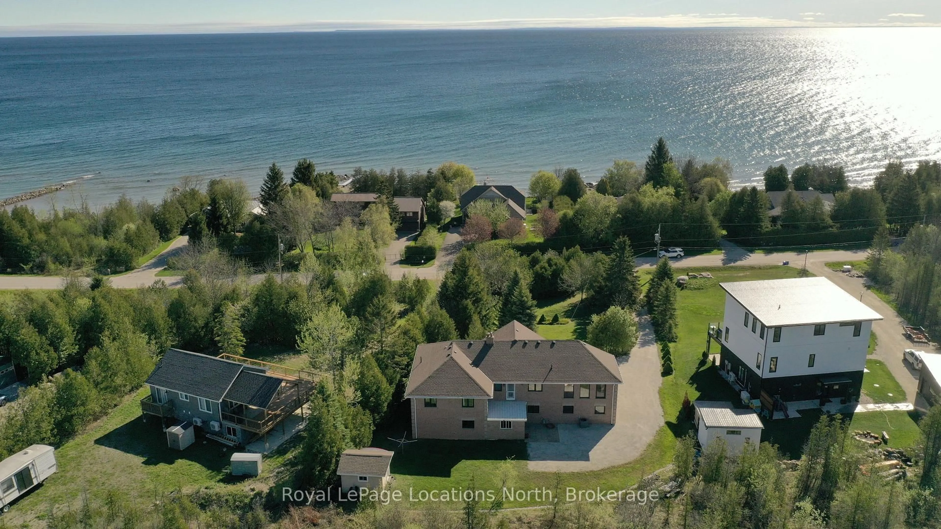 A pic from outside/outdoor area/front of a property/back of a property/a pic from drone, water/lake/river/ocean view for 252 Lakeshore Rd, Meaford Ontario N4L 1W5