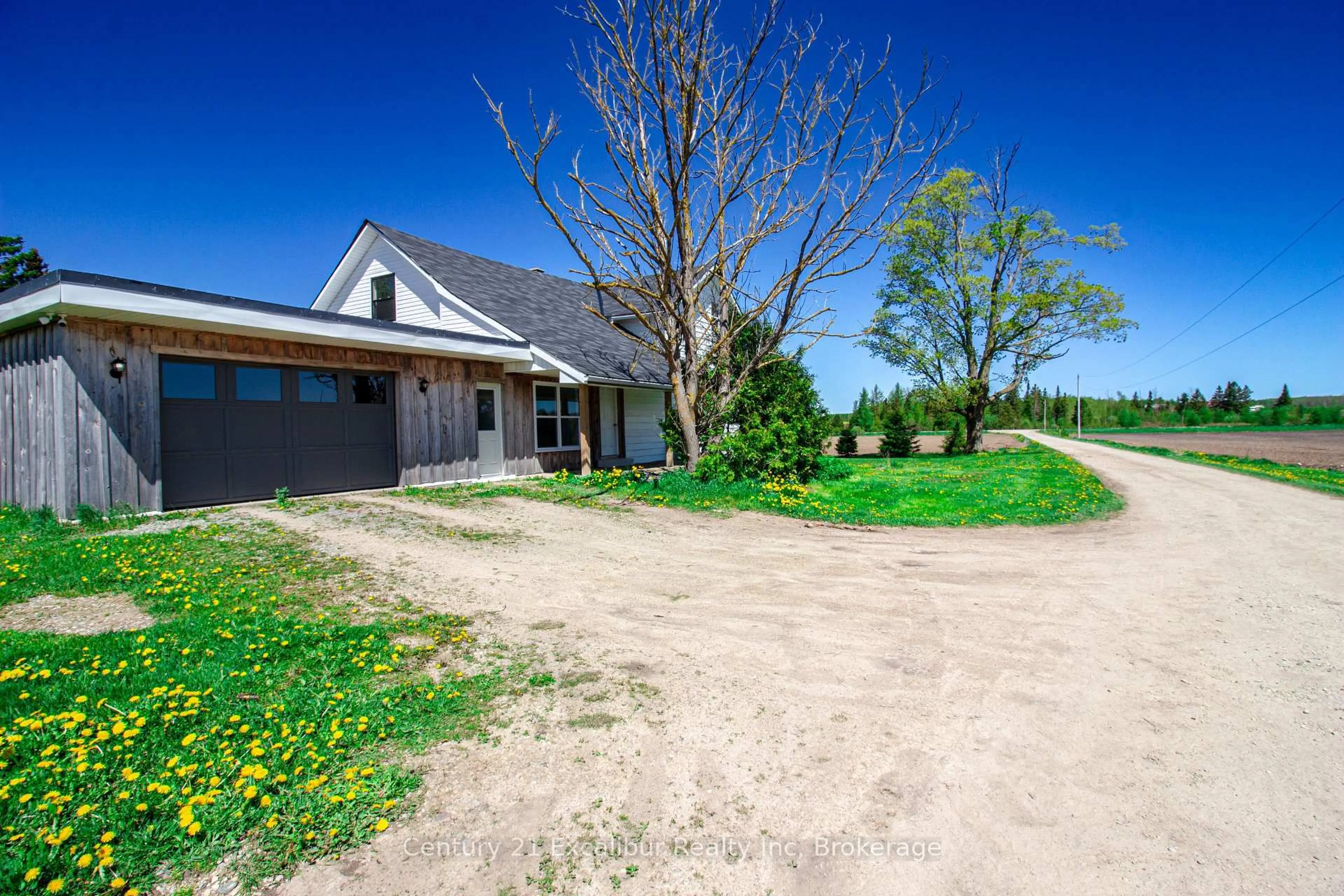 A pic from outside/outdoor area/front of a property/back of a property/a pic from drone, street for 8323 Line 12 Rd, Wellington North Ontario N1H 6J2
