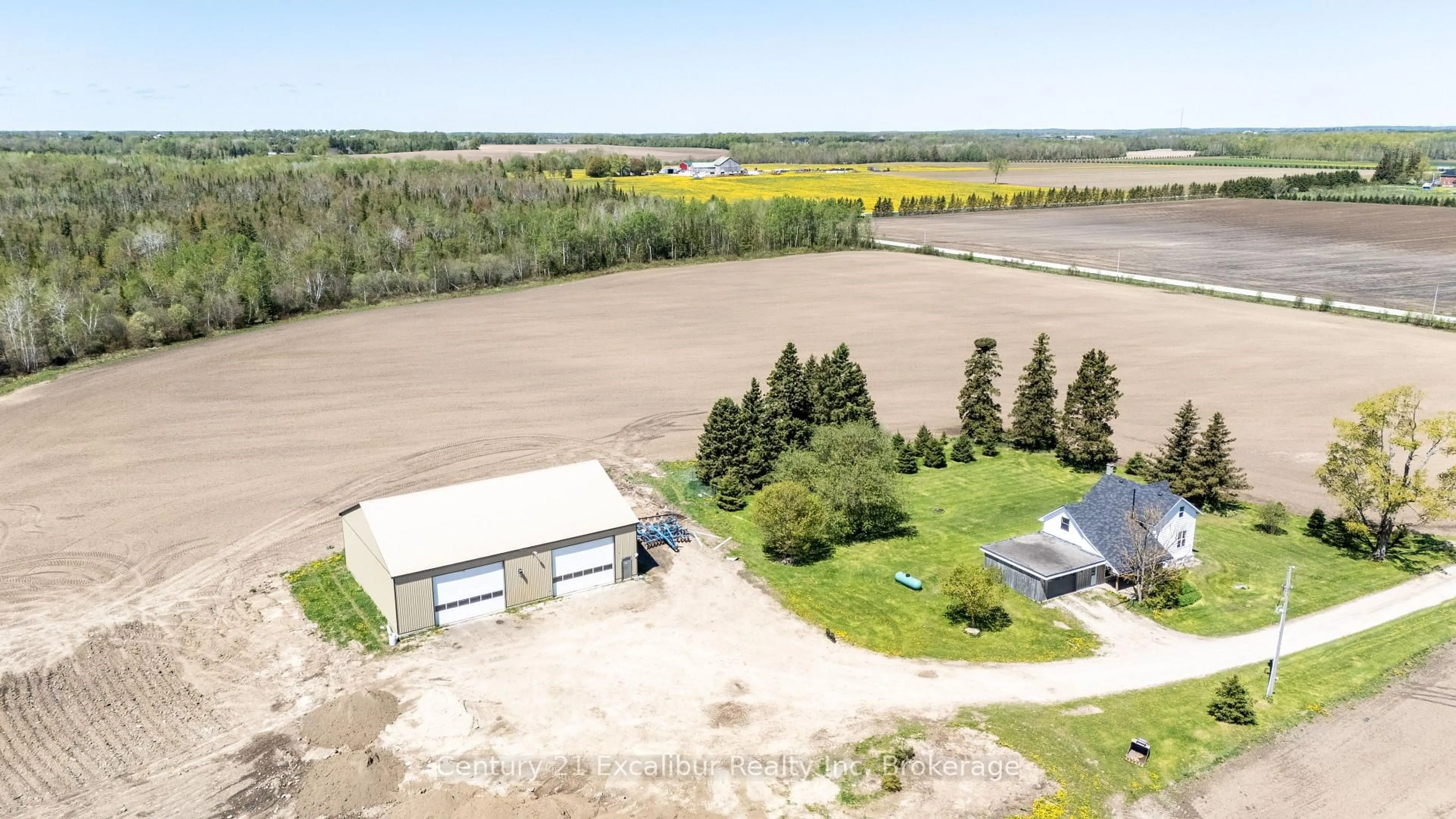 A pic from outside/outdoor area/front of a property/back of a property/a pic from drone, water/lake/river/ocean view for 8323 Line 12 Rd, Wellington North Ontario N1H 6J2