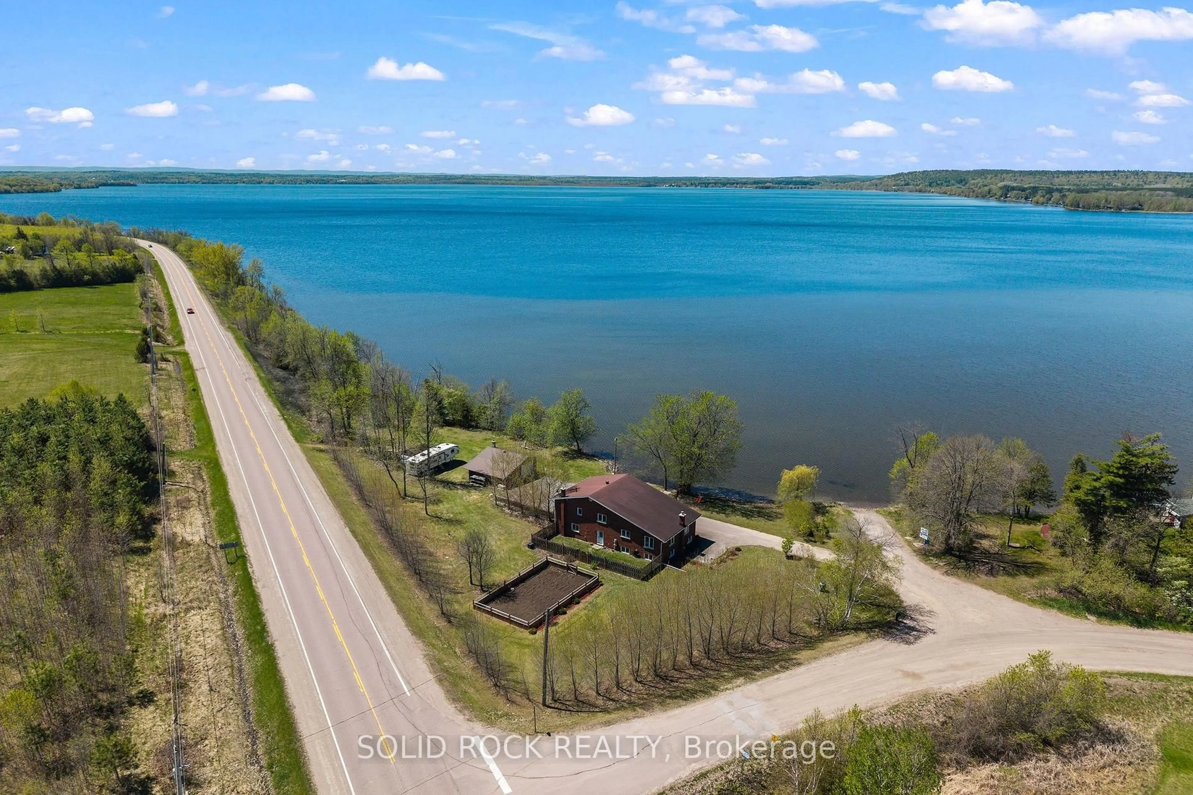 A pic from outside/outdoor area/front of a property/back of a property/a pic from drone, water/lake/river/ocean view for 86 Township Park Rd, Eganville Ontario K0J 1T0