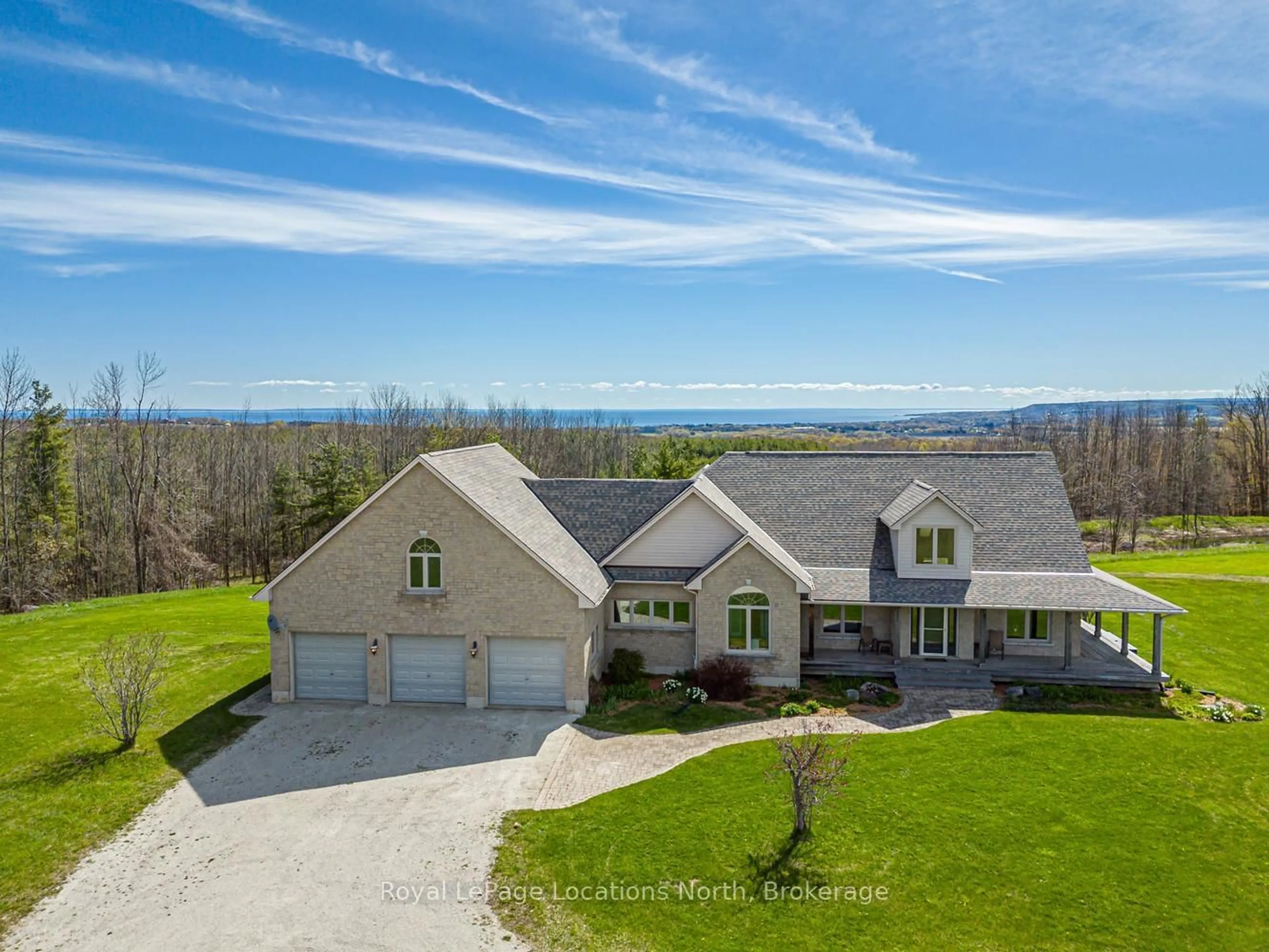 A pic from outside/outdoor area/front of a property/back of a property/a pic from drone, water/lake/river/ocean view for 245337 22 Sdrd, Meaford Ontario N4L 1W5