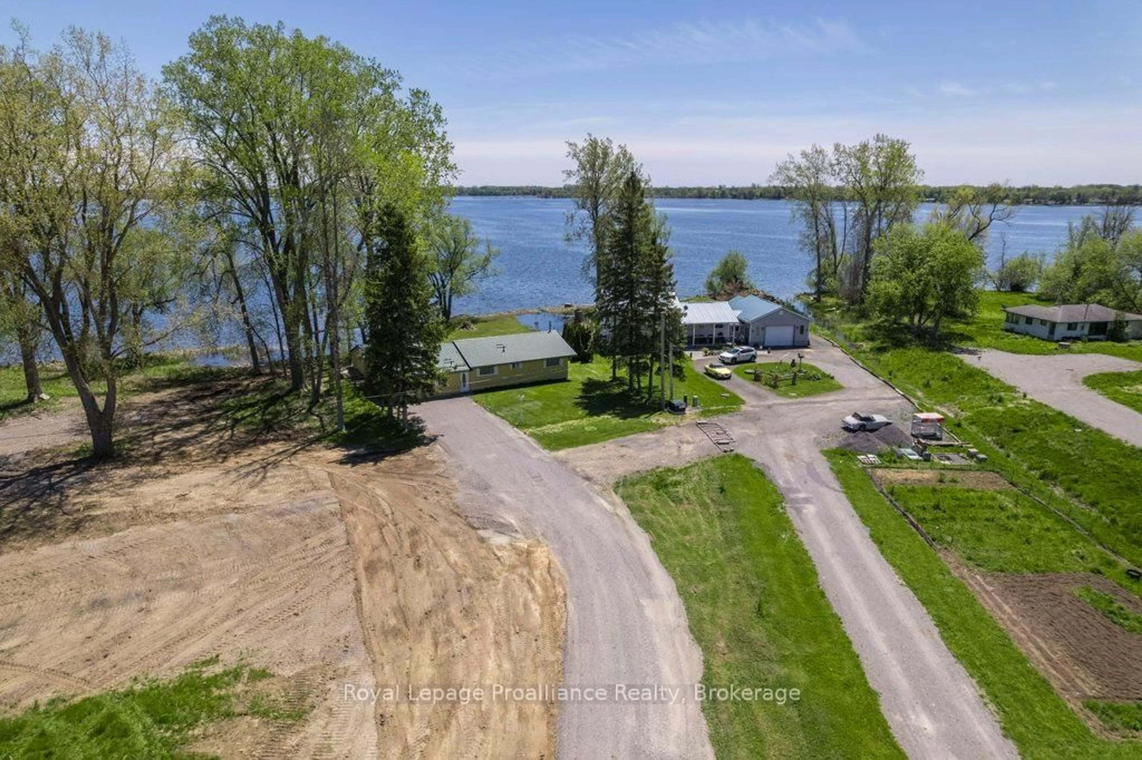 A pic from outside/outdoor area/front of a property/back of a property/a pic from drone, water/lake/river/ocean view for 22579 Loyalist Pkwy, Quinte West Ontario K8V 5P6