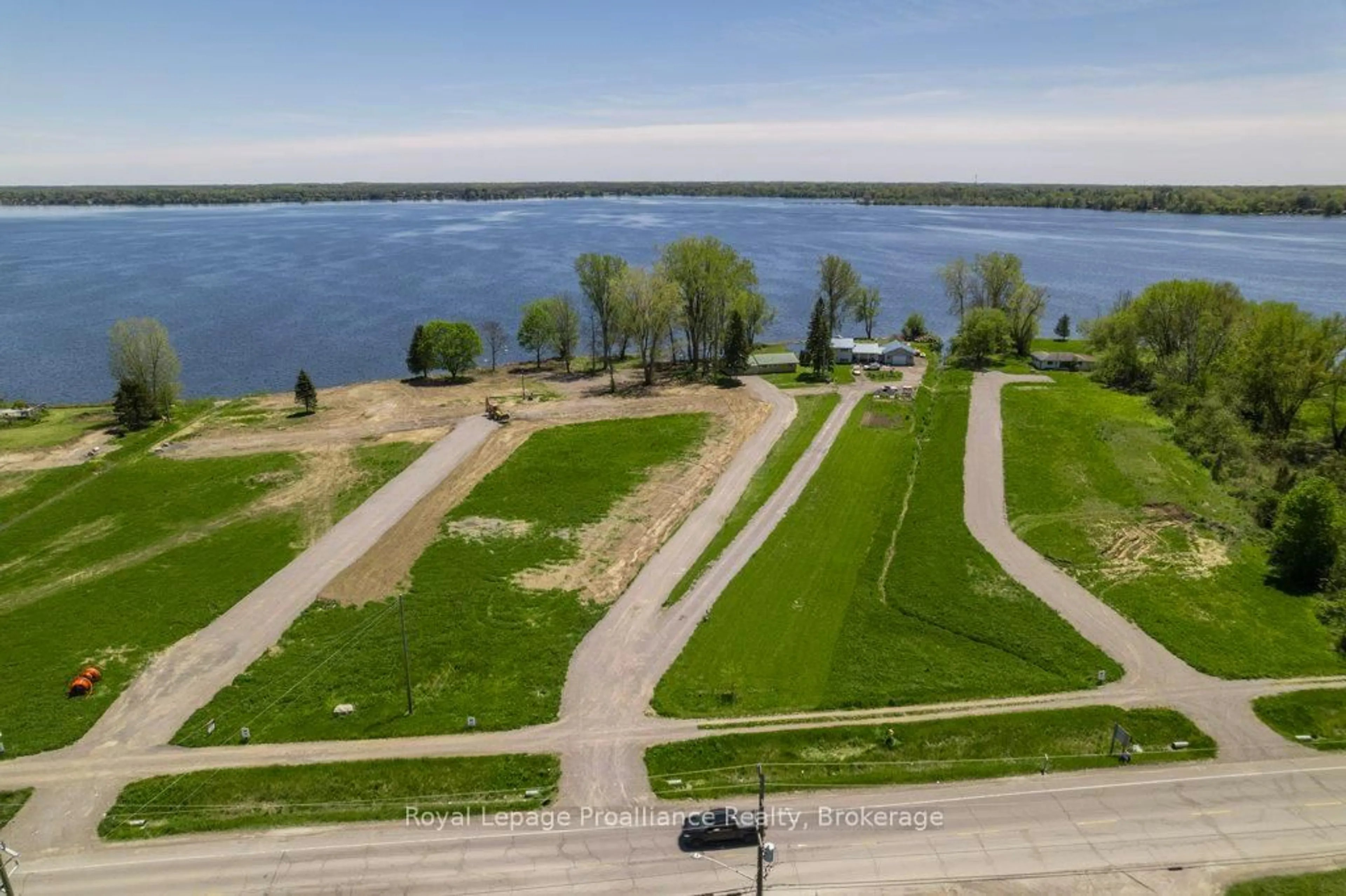 A pic from outside/outdoor area/front of a property/back of a property/a pic from drone, water/lake/river/ocean view for 22579 Loyalist Pkwy, Quinte West Ontario K8V 5P6