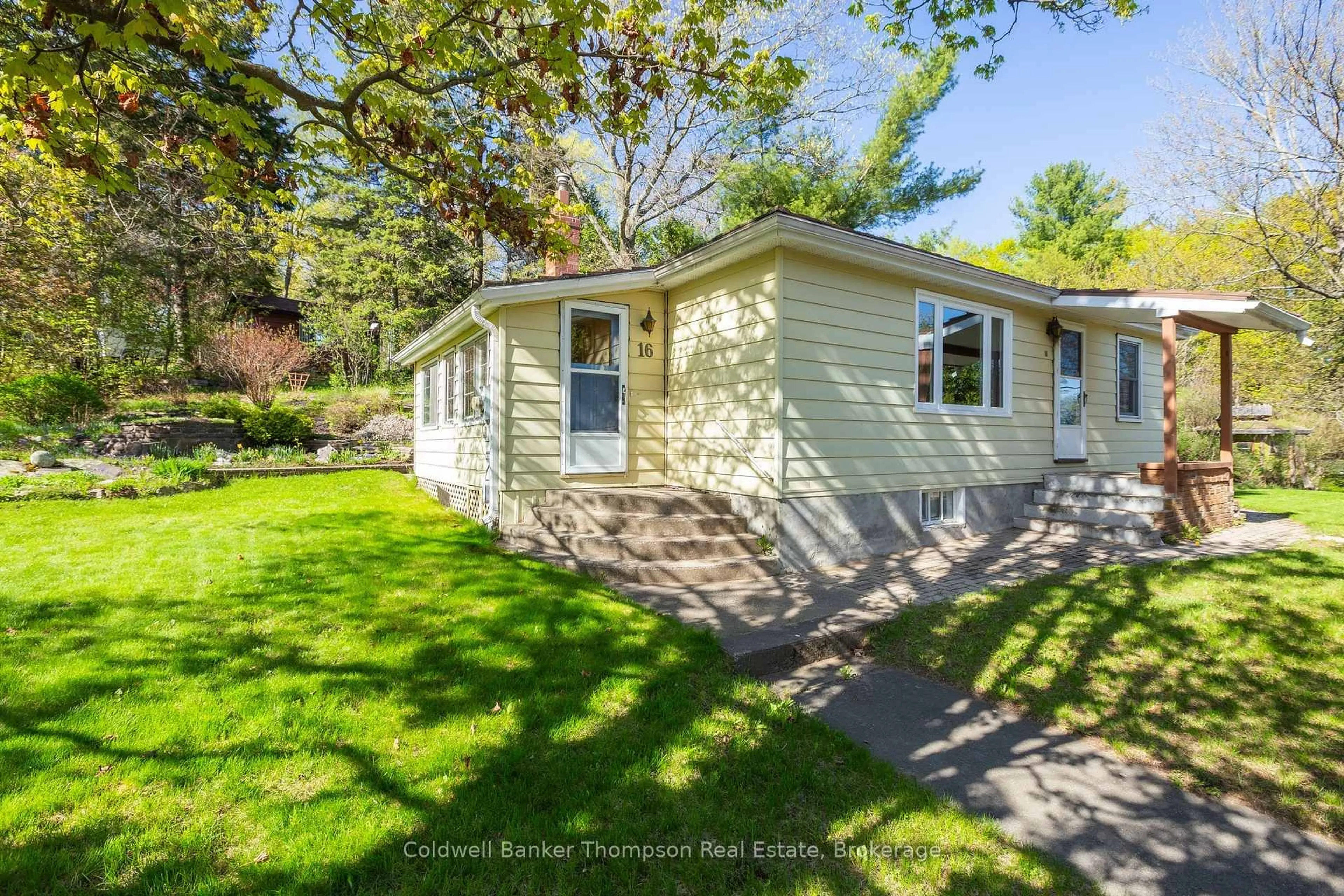 Home with vinyl exterior material, street for 16 West Rd, Huntsville Ontario P1H 1L2