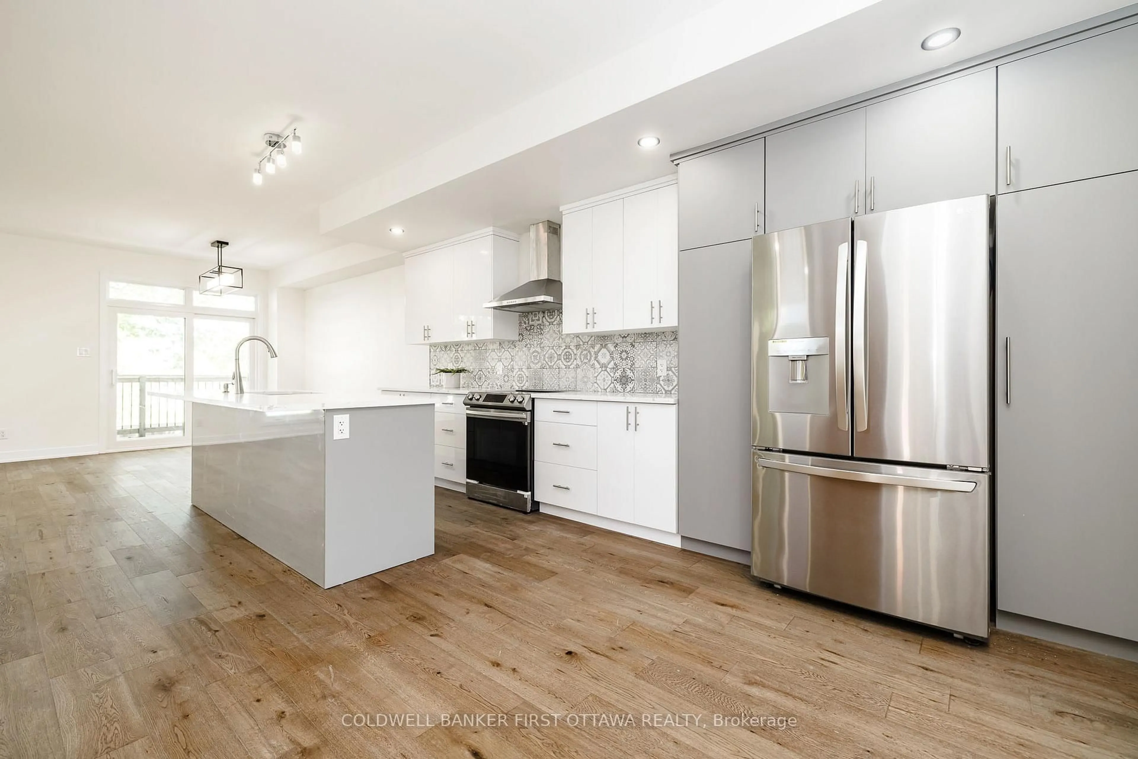 Open concept kitchen, wood/laminate floor for 31 Francis St, Carleton Place Ontario K7C 2J5