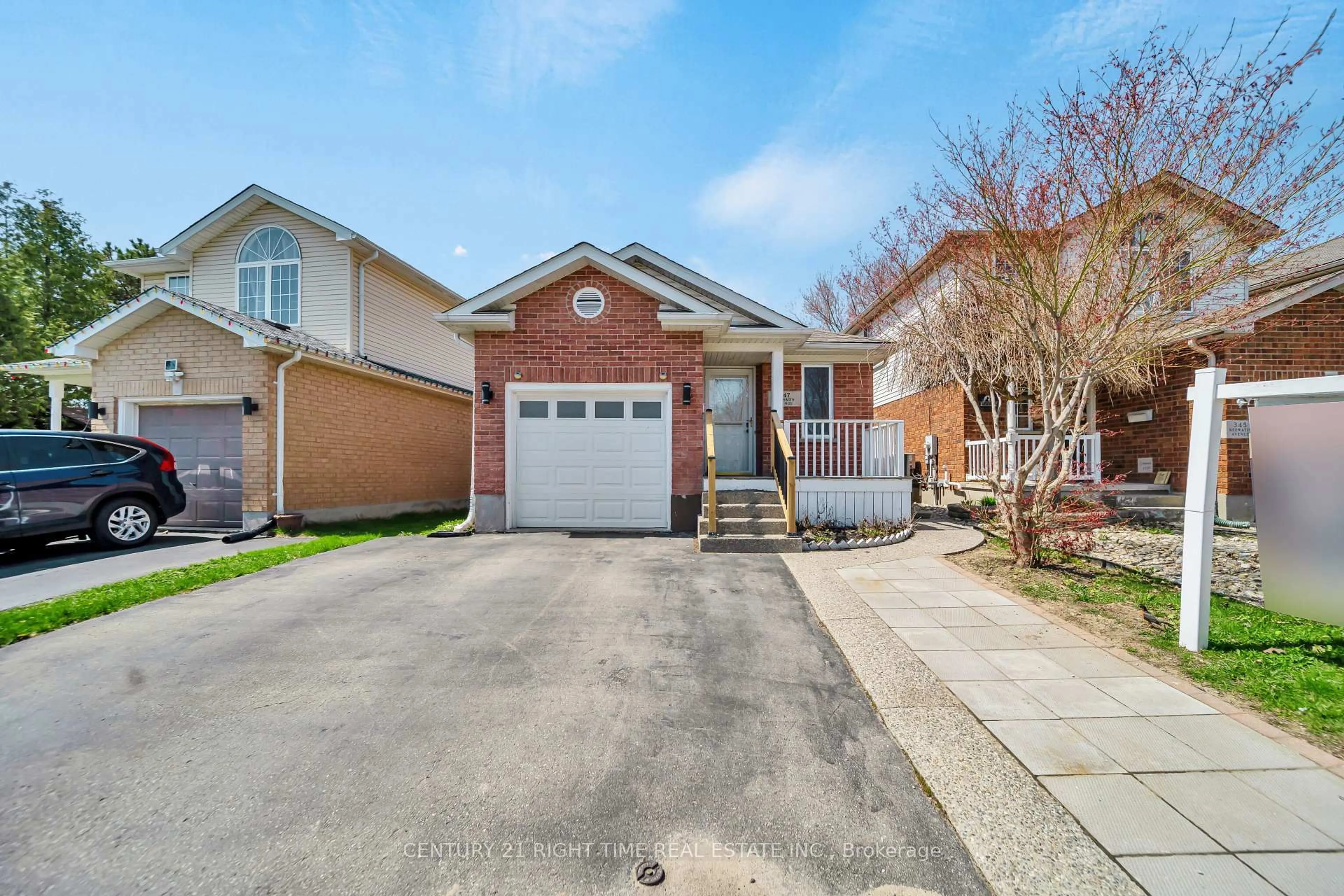 Home with brick exterior material, street for 347 Keewatin Ave, Kitchener Ontario N2B 3W2