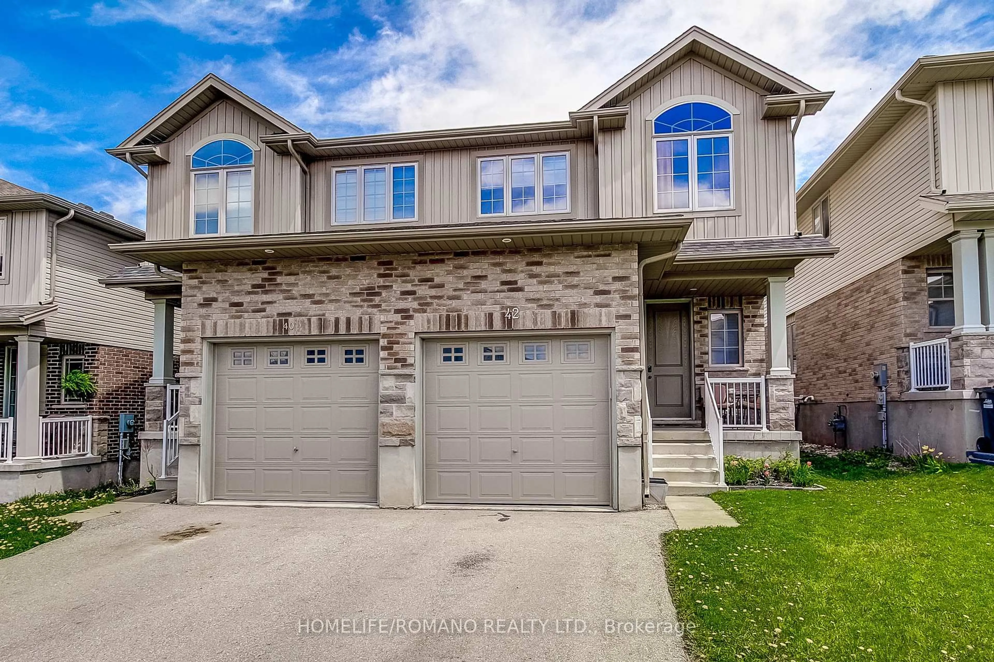 Home with brick exterior material, street for 42 Dallan Dr, Guelph Ontario N1L 0N1
