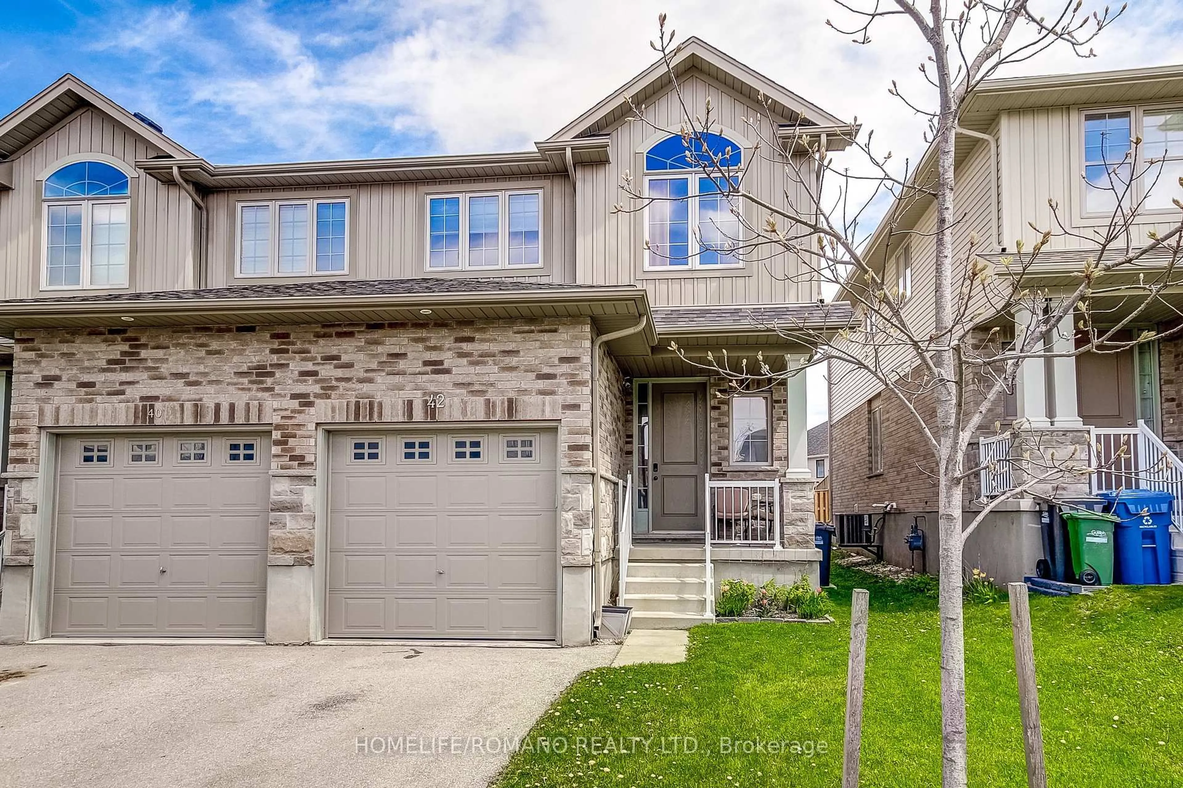Home with vinyl exterior material, street for 42 Dallan Dr, Guelph Ontario N1L 0N1