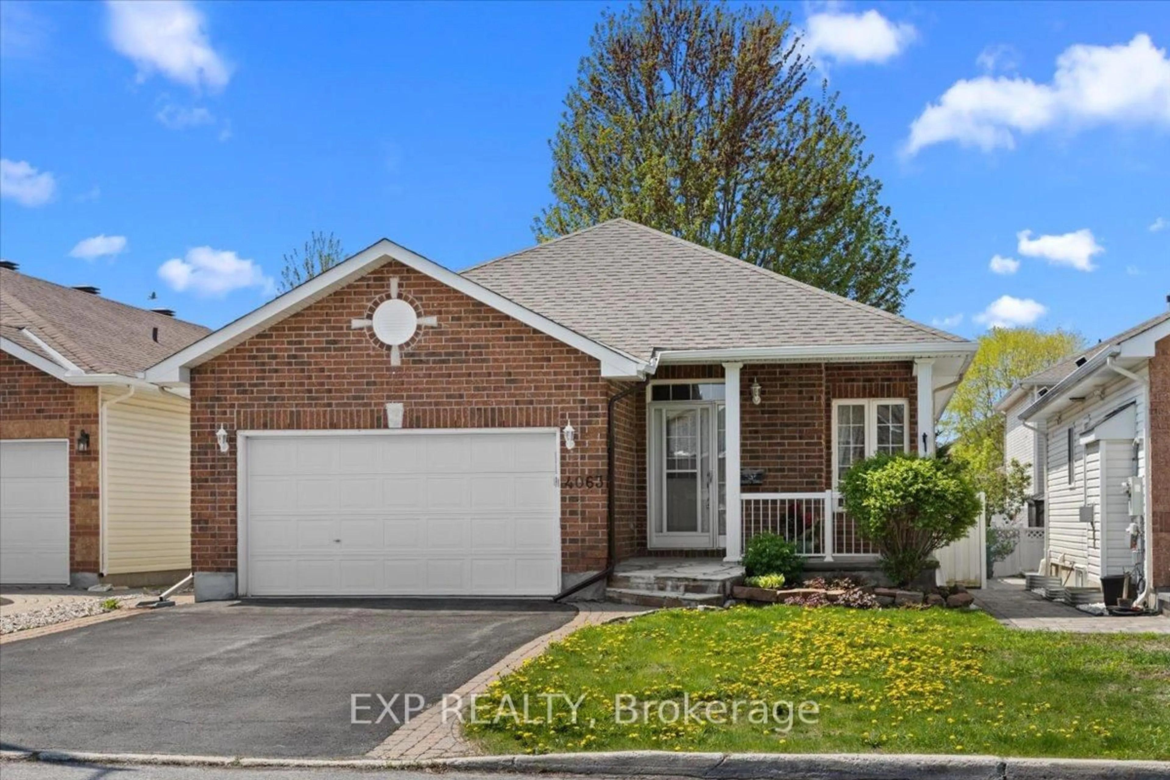 Home with brick exterior material, street for 4063 Canyon Walk Dr, Gloucester Ontario K1V 1W2