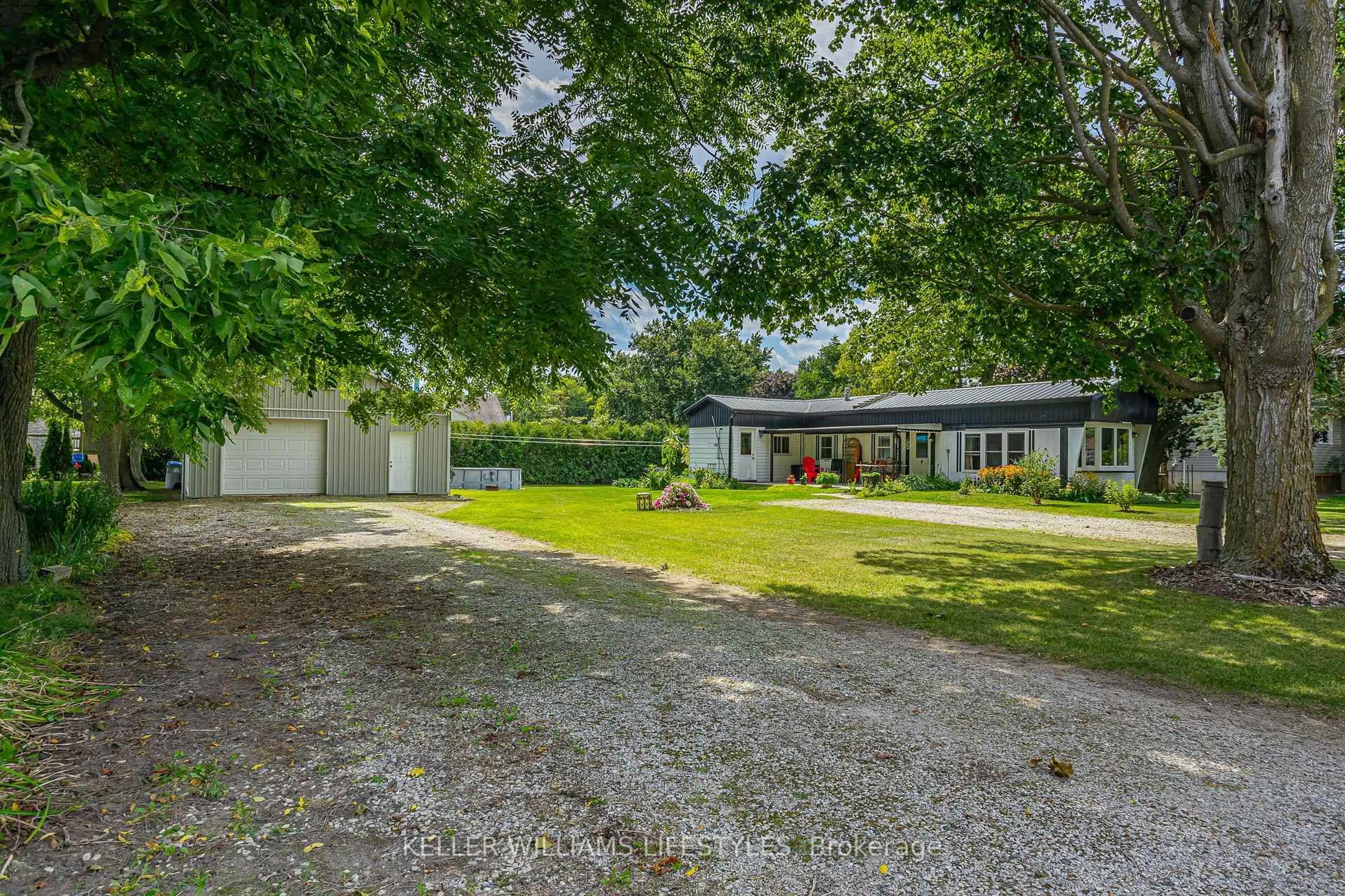 A pic from outside/outdoor area/front of a property/back of a property/a pic from drone, street for 4403 Queens Ave, North Middlesex Ontario N0M 1A0