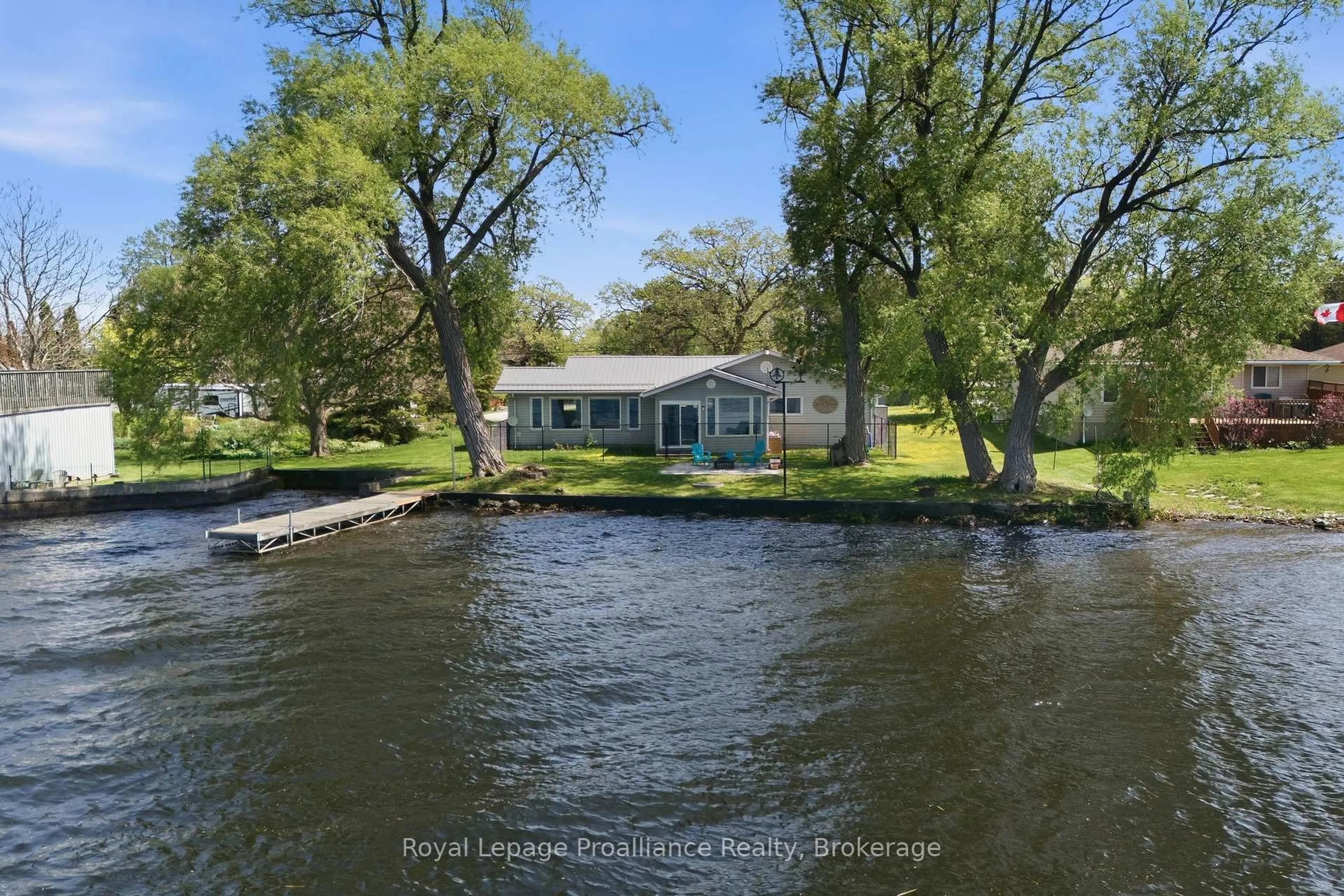 A pic from outside/outdoor area/front of a property/back of a property/a pic from drone, water/lake/river/ocean view for 33 Peats Point Lane, Prince Edward County Ontario K8N 4Z7