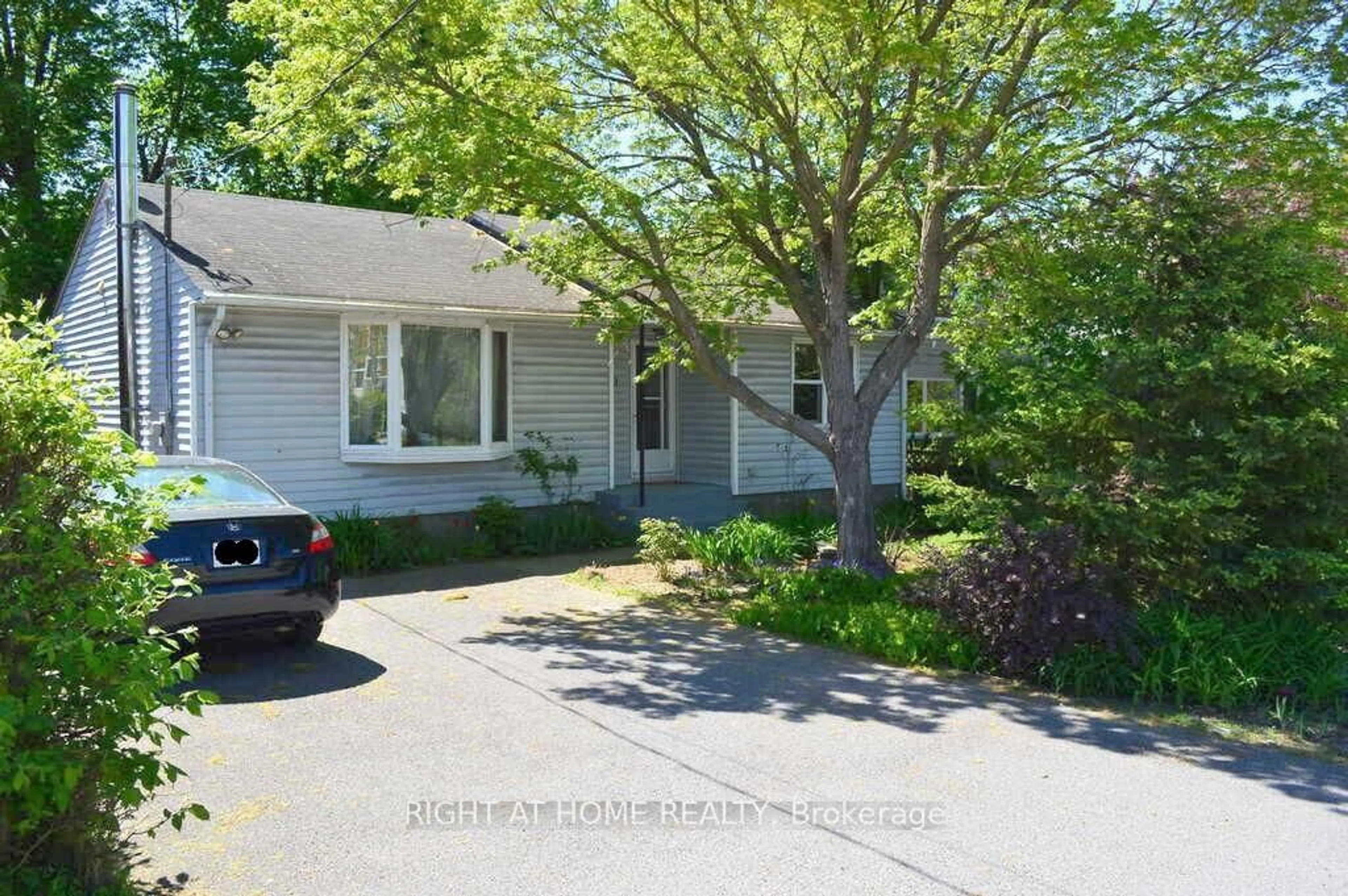 A pic from outside/outdoor area/front of a property/back of a property/a pic from drone, street for 200 Woodroffe Ave, Ottawa Ontario K2A 3V4