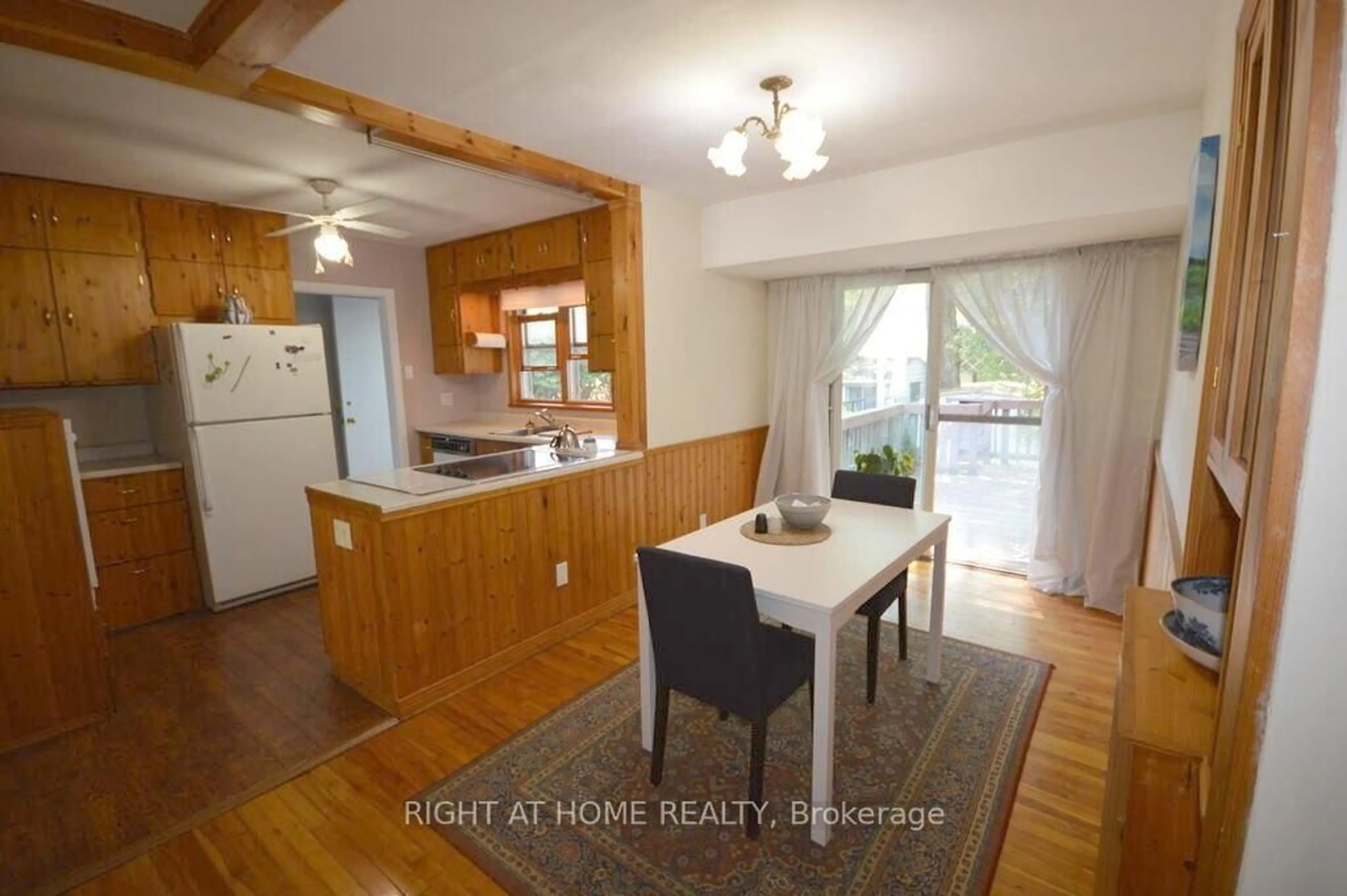 Dining room, wood/laminate floor for 200 Woodroffe Ave, Ottawa Ontario K2A 3V4