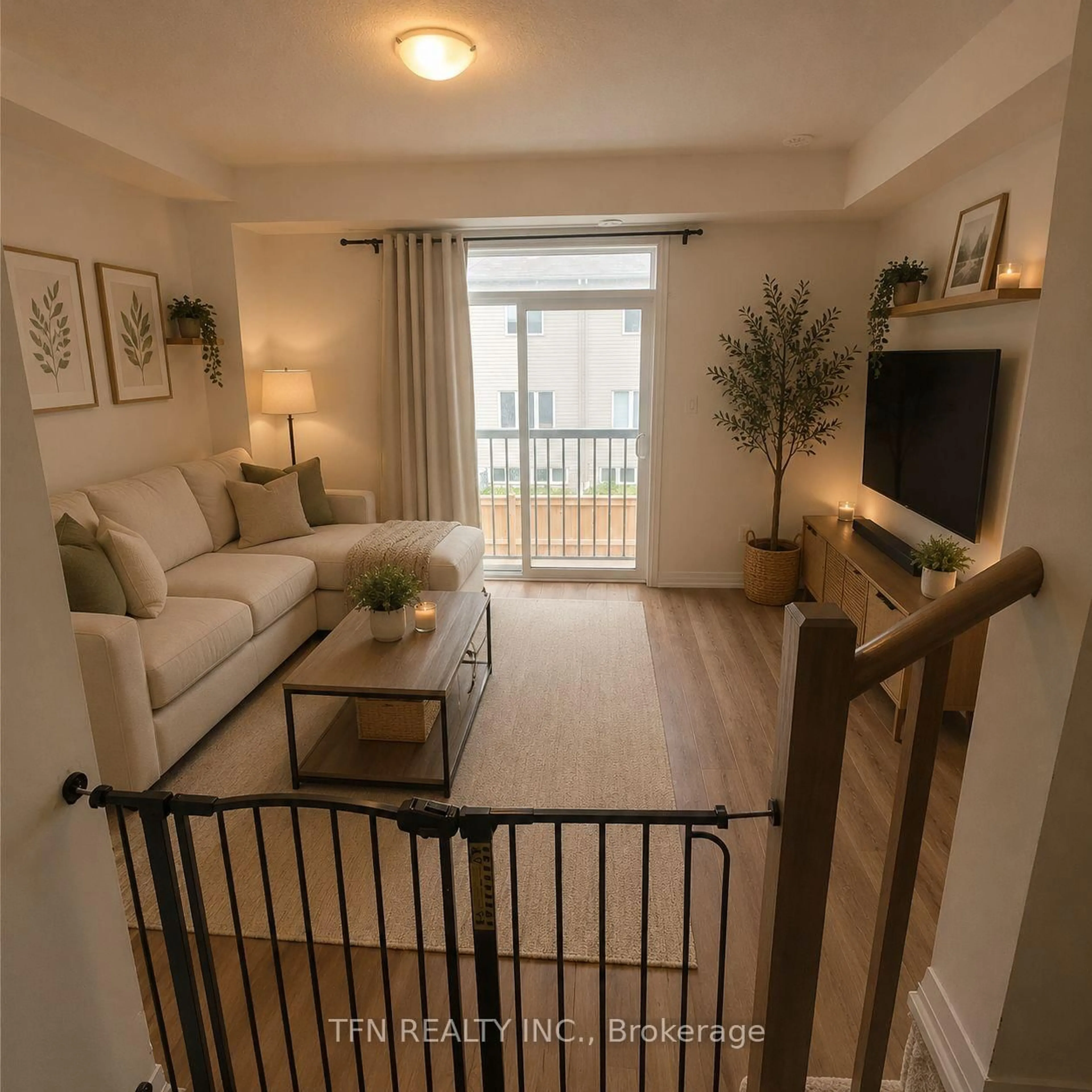 Living room with furniture, wood/laminate floor for 389 Conklin Rd #28, Brantford Ontario N3T 0Y3