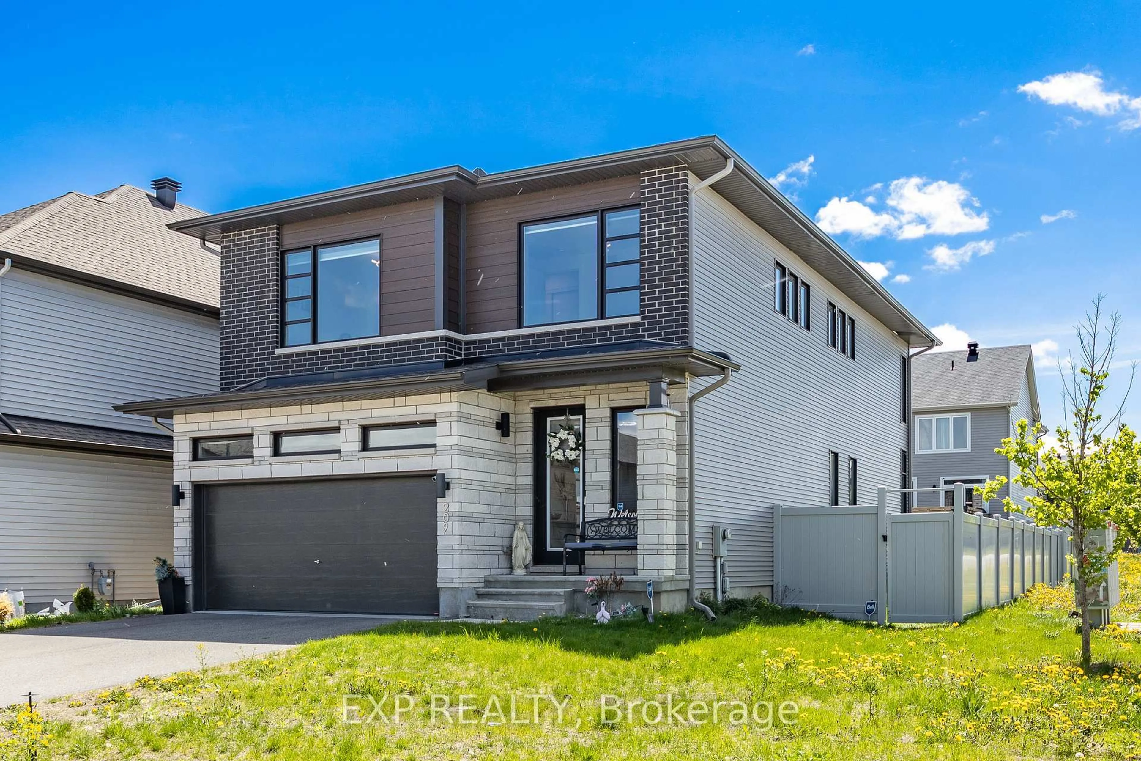 Home with brick exterior material, street for 209 PINGWI Pl, Ottawa Ontario K1X 0G1