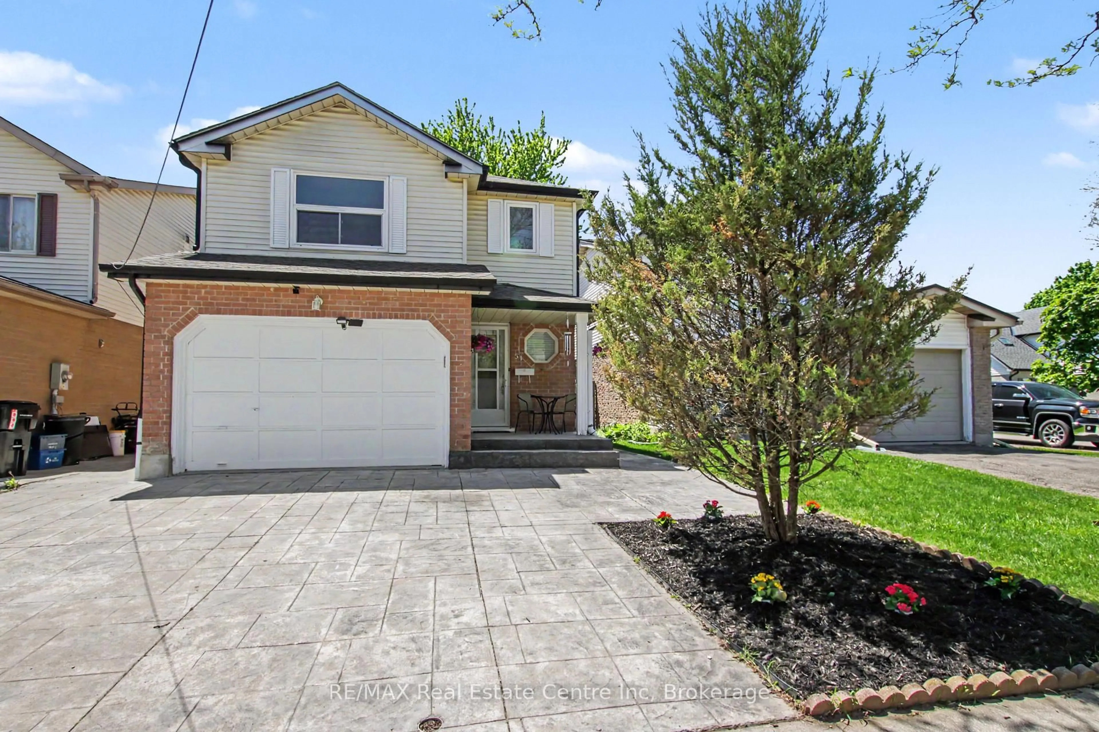 Home with brick exterior material, street for 51 Camrose Crt, Kitchener Ontario N2M 5J4