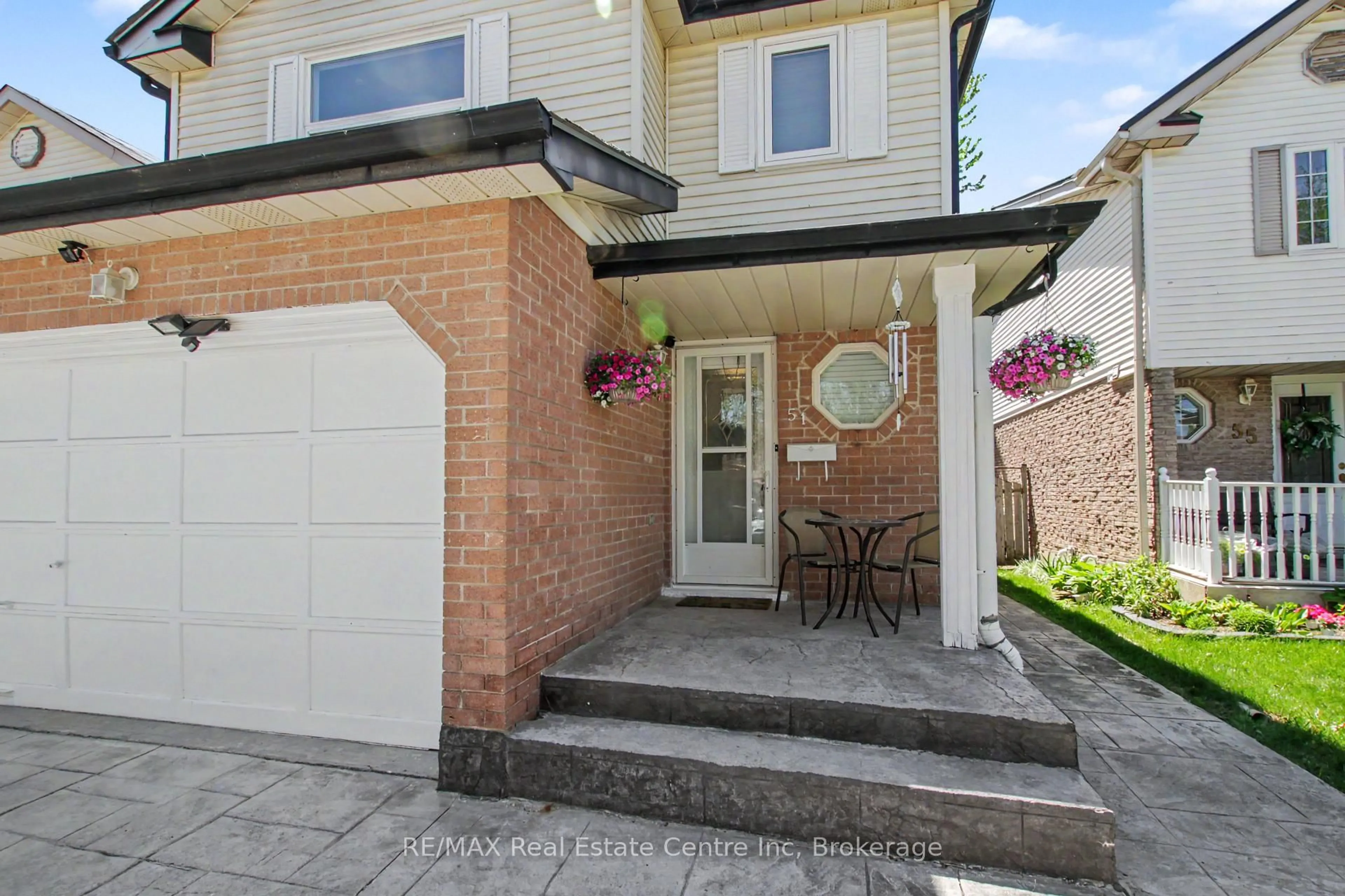 Home with brick exterior material, street for 51 Camrose Crt, Kitchener Ontario N2M 5J4