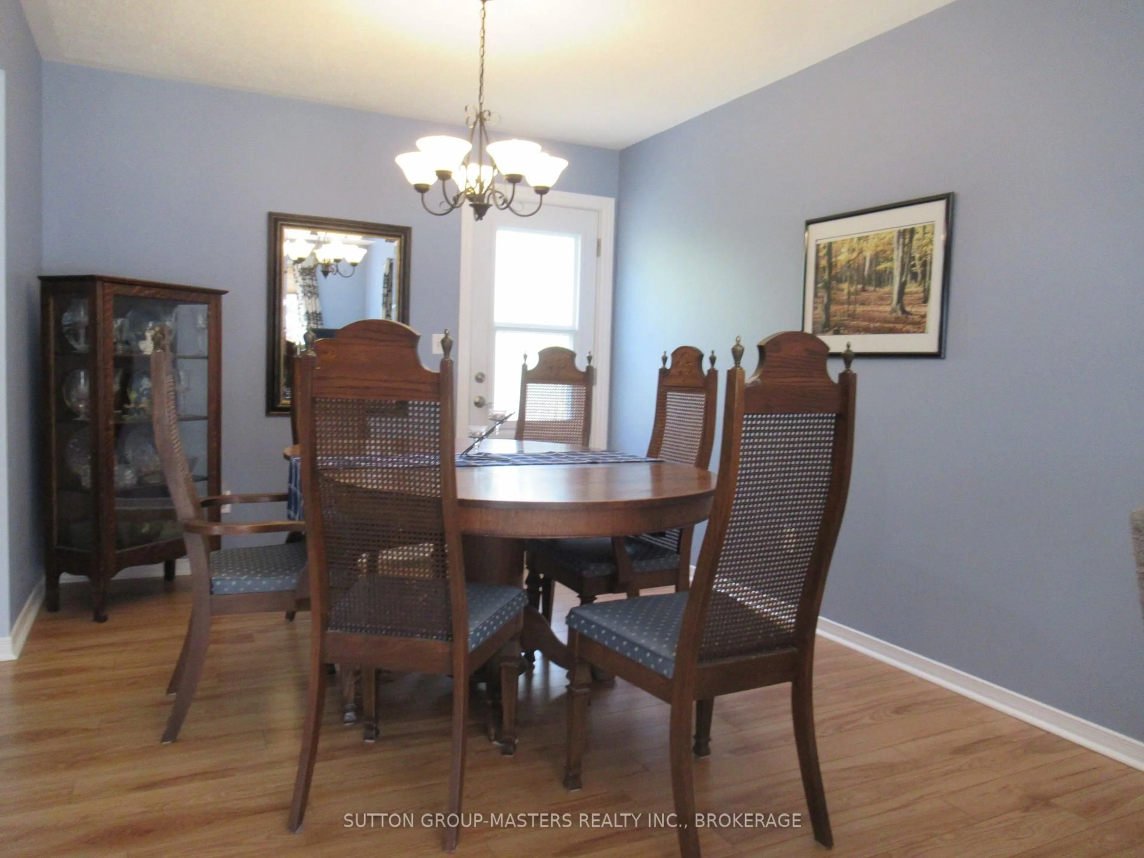 Dining room, wood/laminate floor for 4571 Bath Rd, Loyalist Ontario K7N 1A8