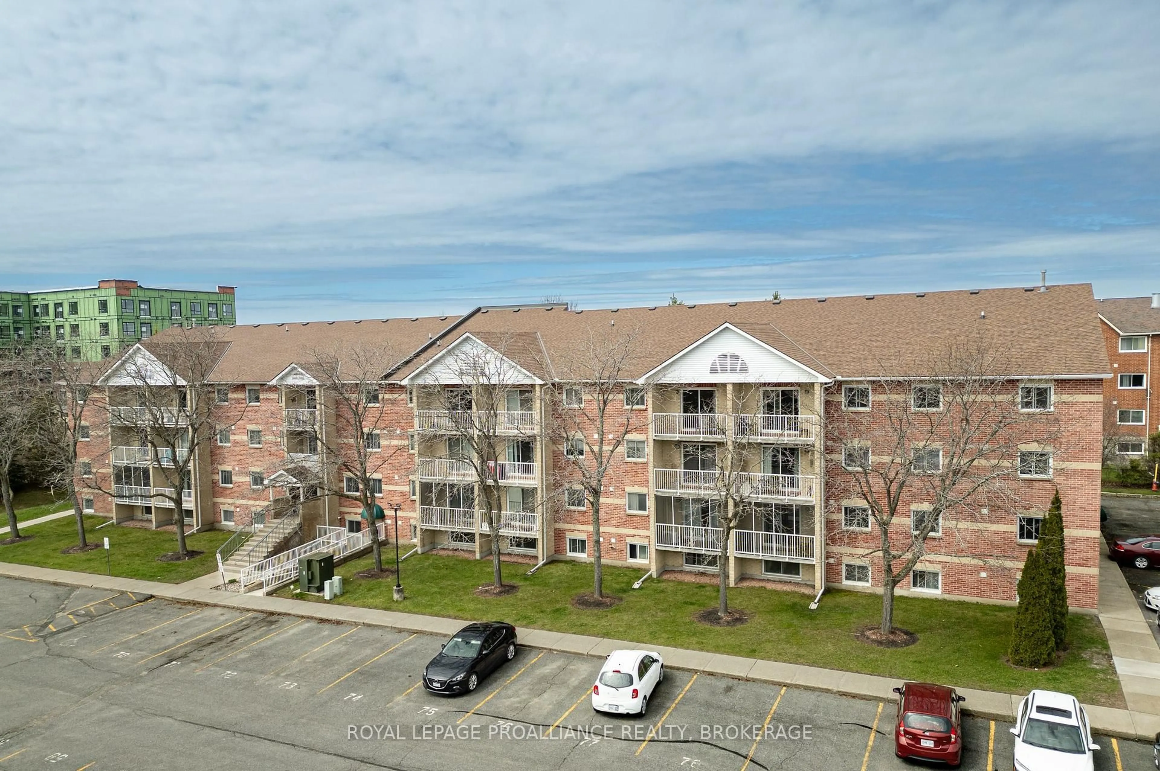A pic from outside/outdoor area/front of a property/back of a property/a pic from drone, unknown for 316 Kingsdale Ave #411, Kingston Ontario K7M 8S2