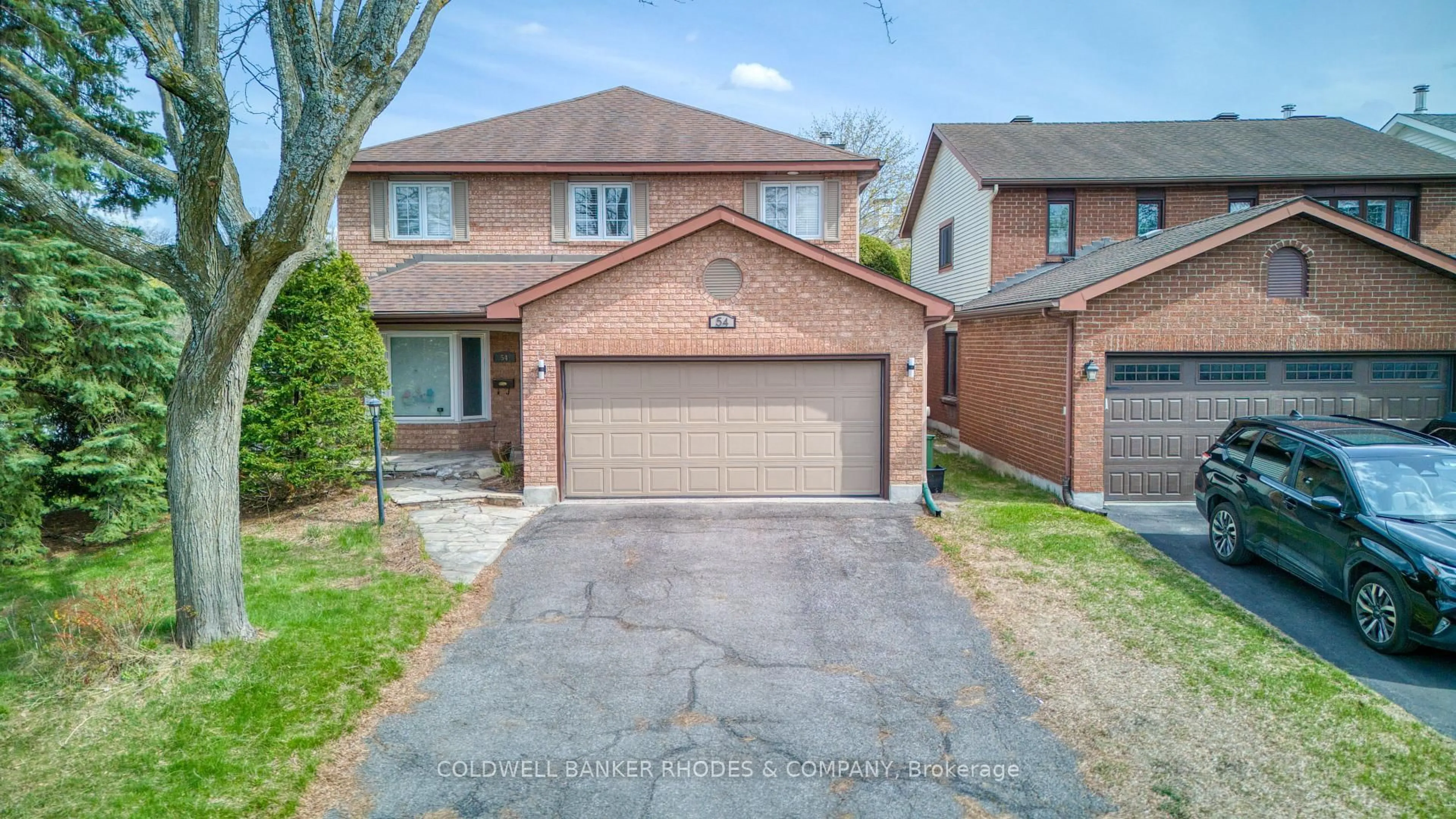 Home with brick exterior material, street for 54 Keys Way, Ottawa Ontario K1G 4M8