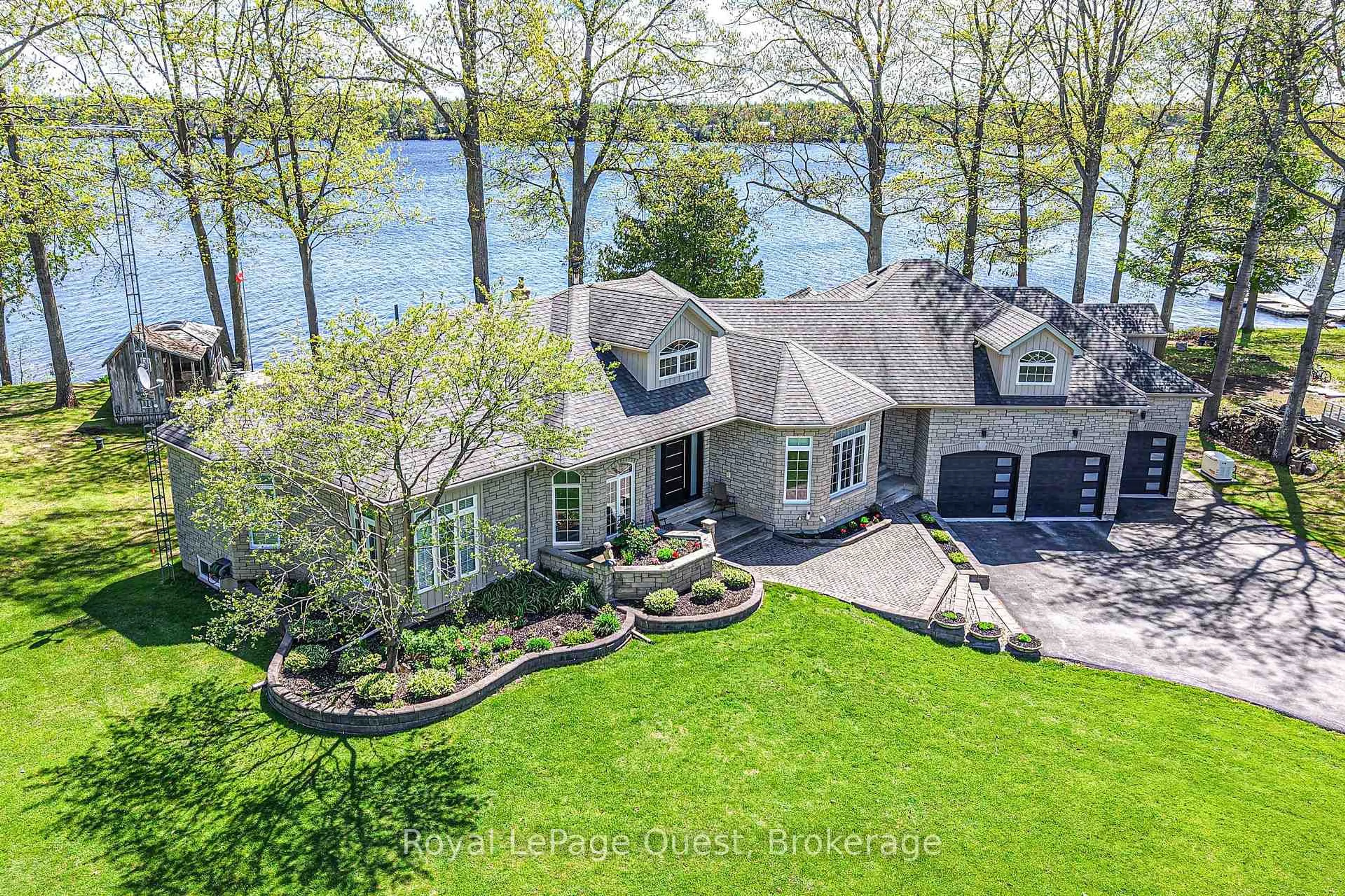 A pic from outside/outdoor area/front of a property/back of a property/a pic from drone, water/lake/river/ocean view for 50 Park Lane, Kawartha Lakes Ontario L0K 1W0