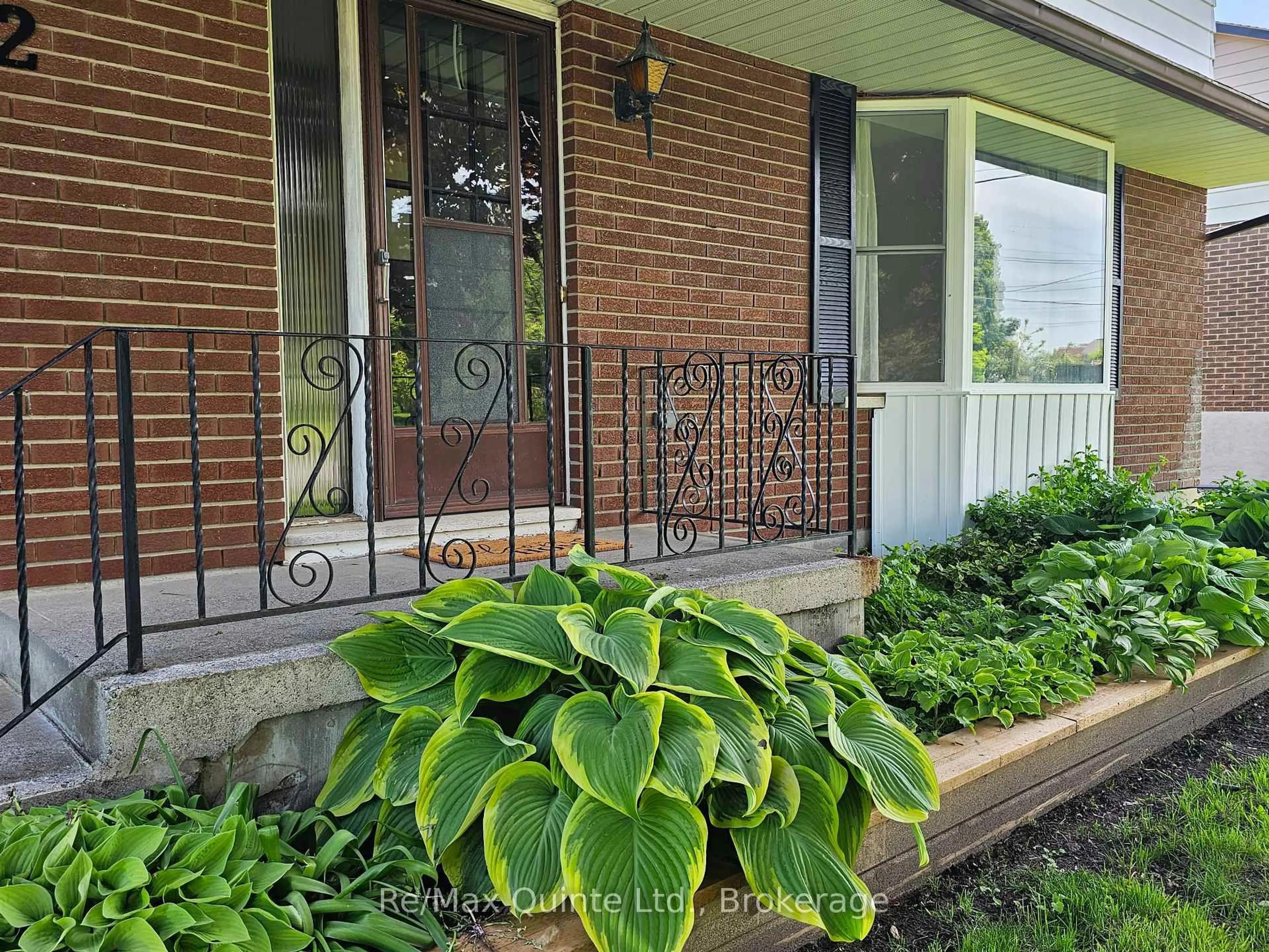 Home with brick exterior material, street for 12 Philip St, Prince Edward County Ontario K0K 2T0