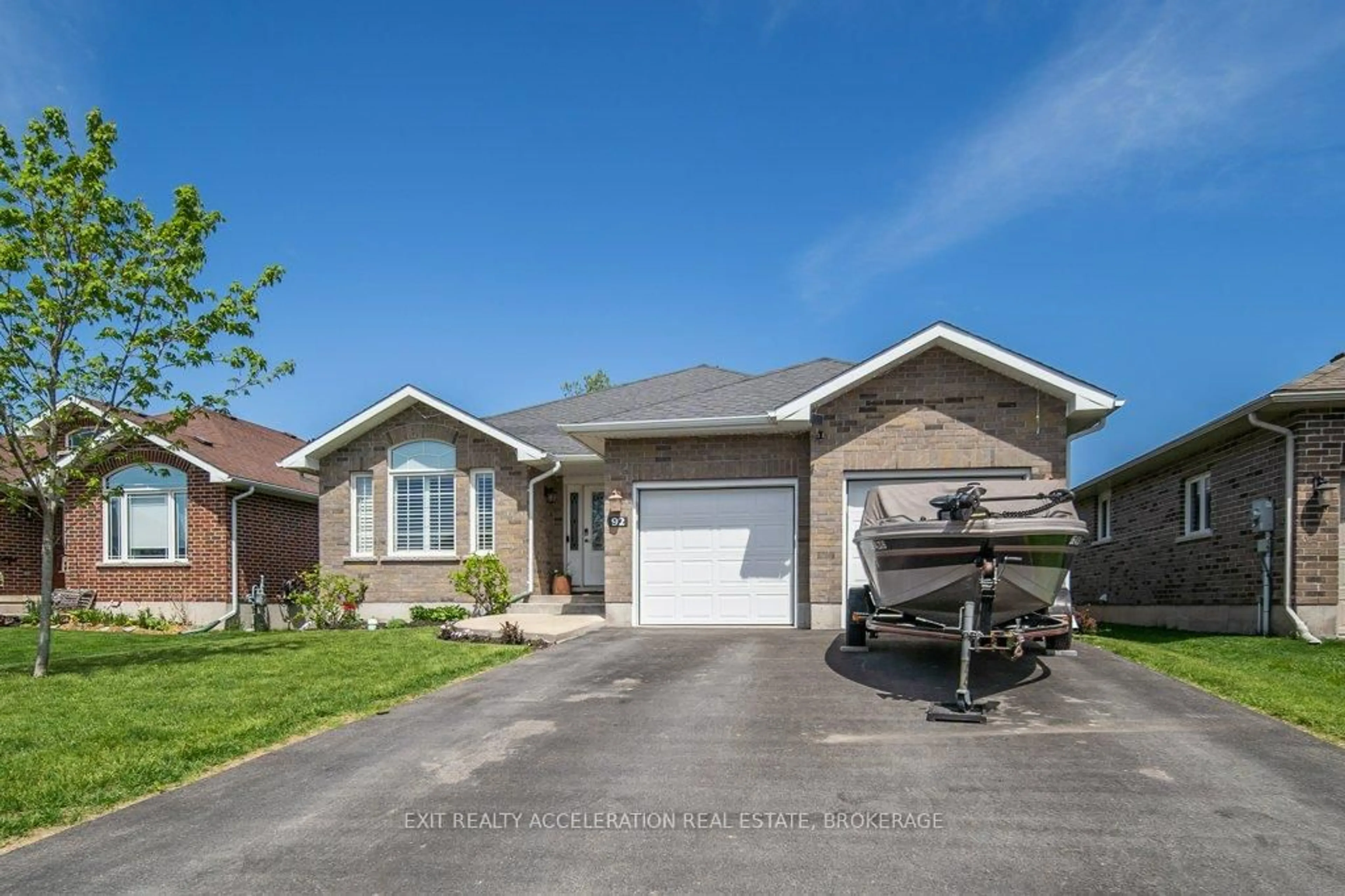 Home with brick exterior material, street for 92 Hartwood Cres, Greater Napanee Ontario K7R 0A8