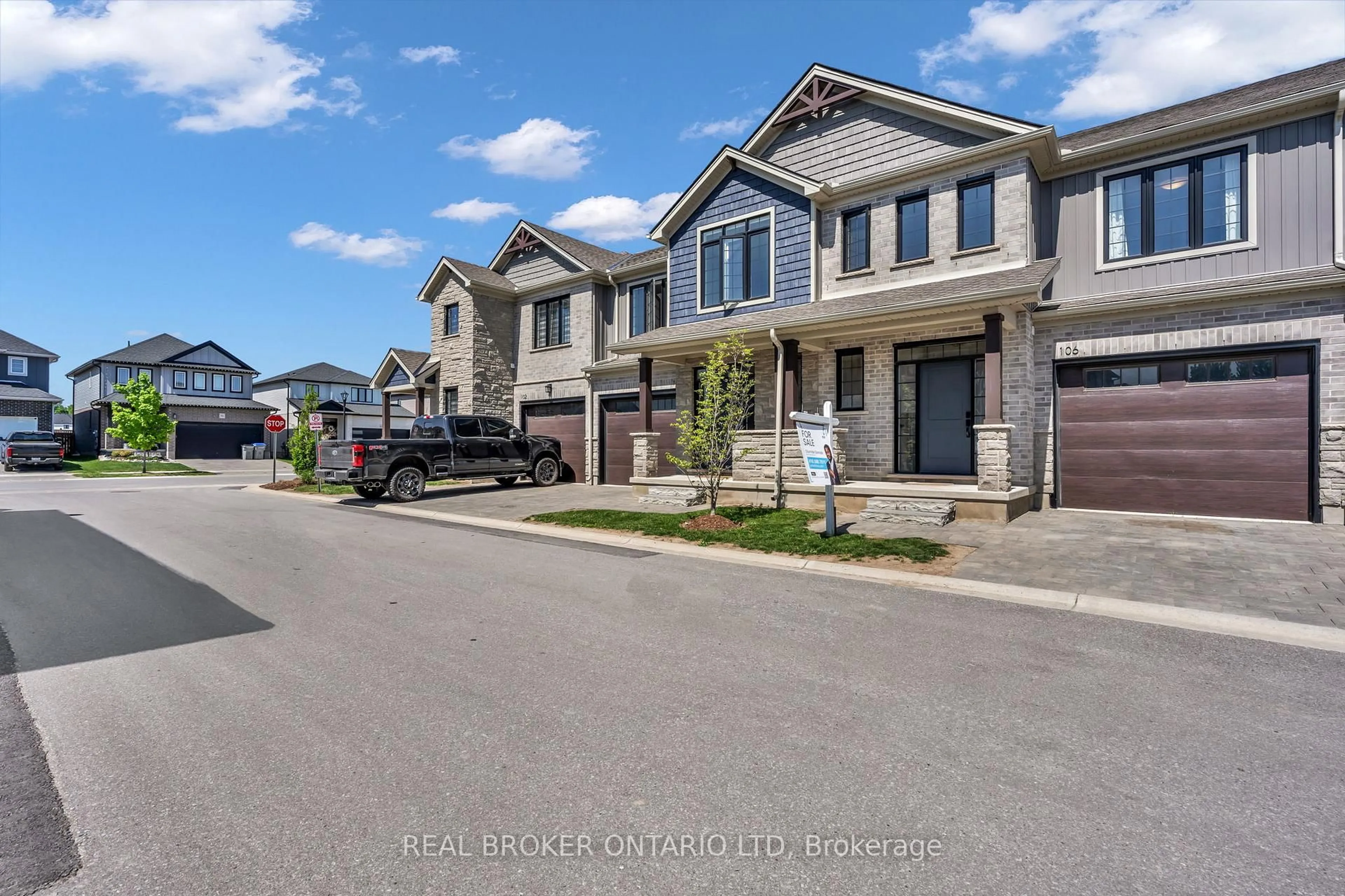 A pic from outside/outdoor area/front of a property/back of a property/a pic from drone, street for 93 Stonefield Lane #106, Middlesex Centre Ontario N0M 2A0